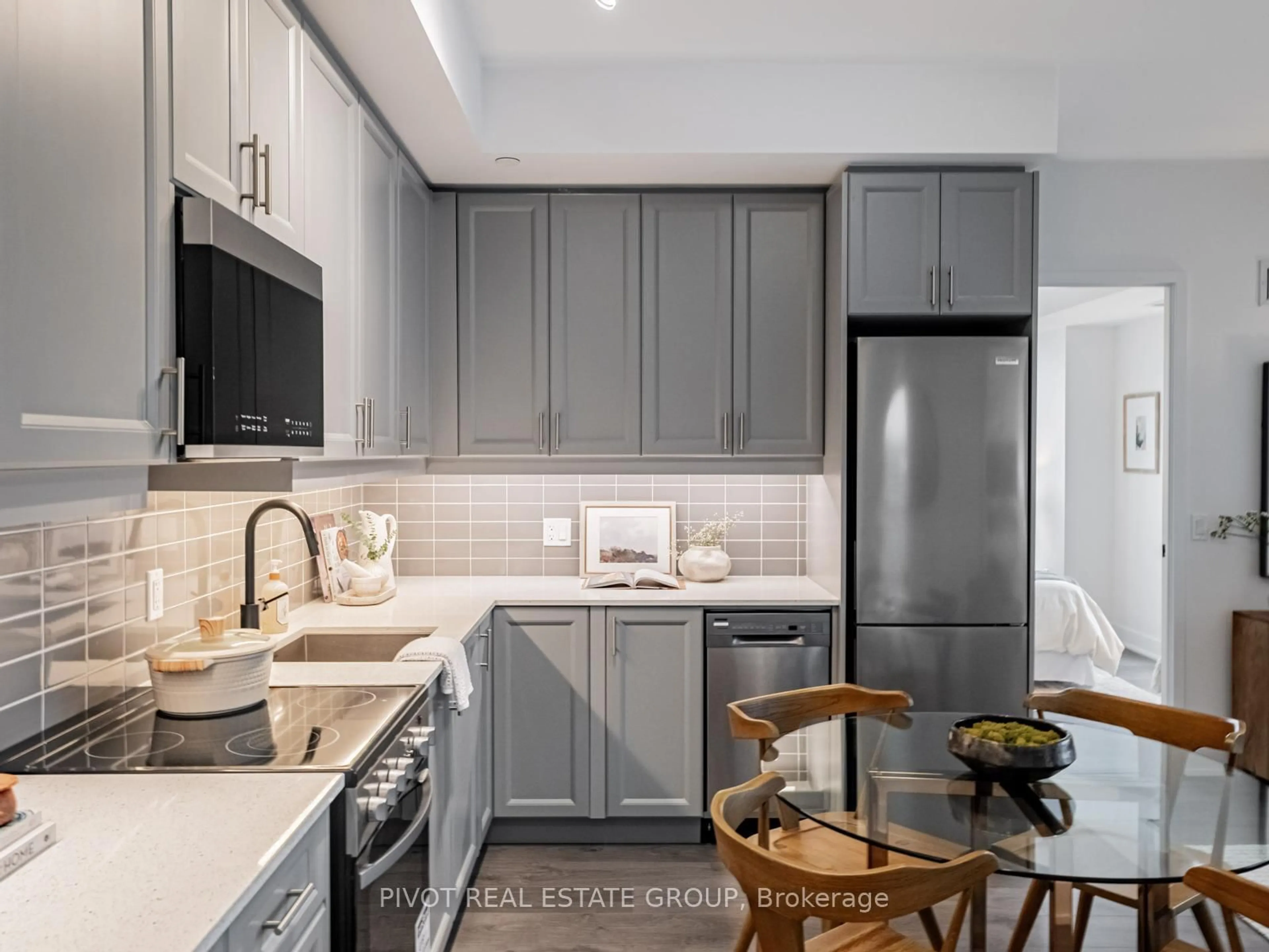 Open concept kitchen, ceramic/tile floor for 2333 Khalsa Gate #311, Oakville Ontario L6M 0X7