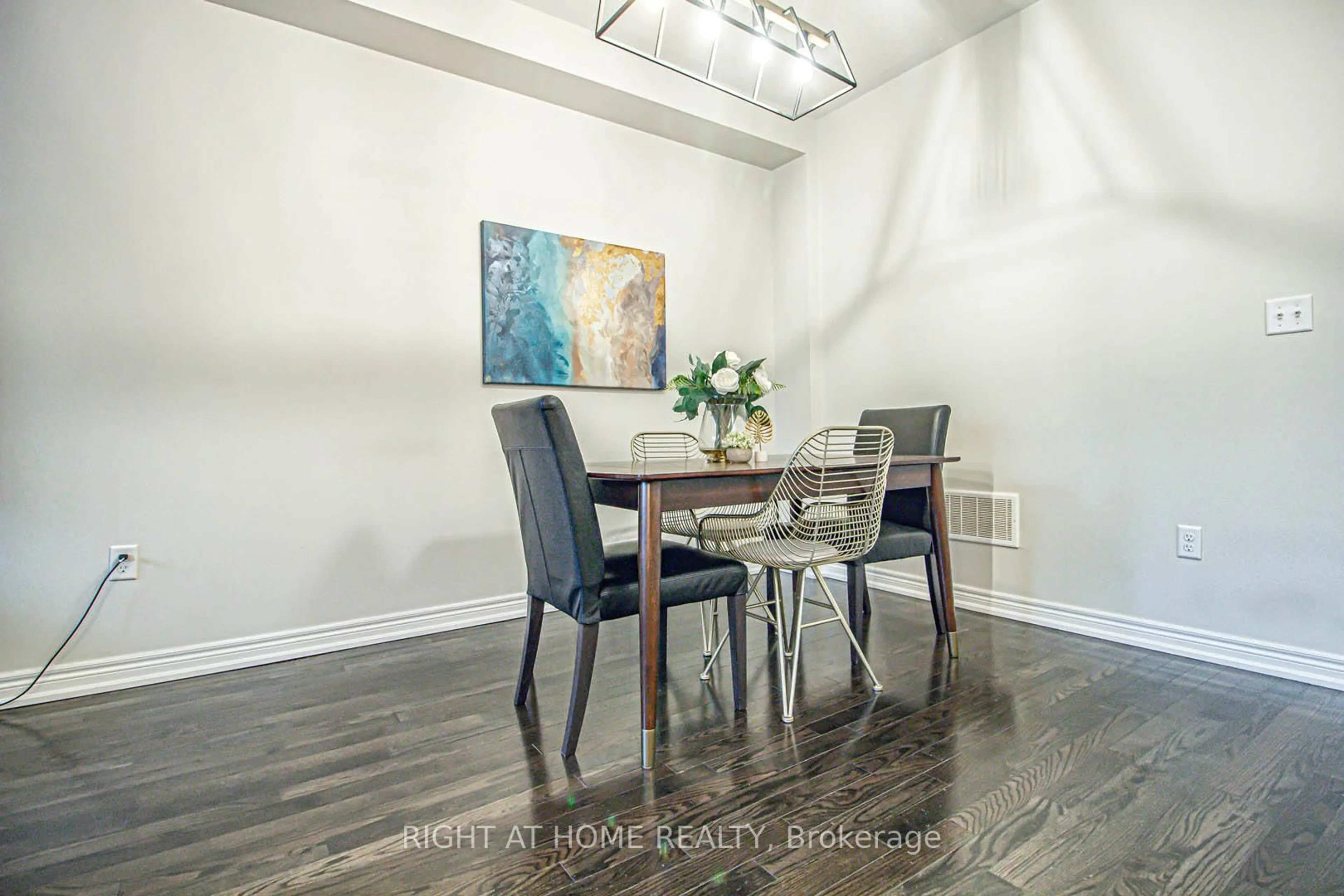 Dining room, wood/laminate floor for 1358 Granrock Cres, Mississauga Ontario L5V 0E1