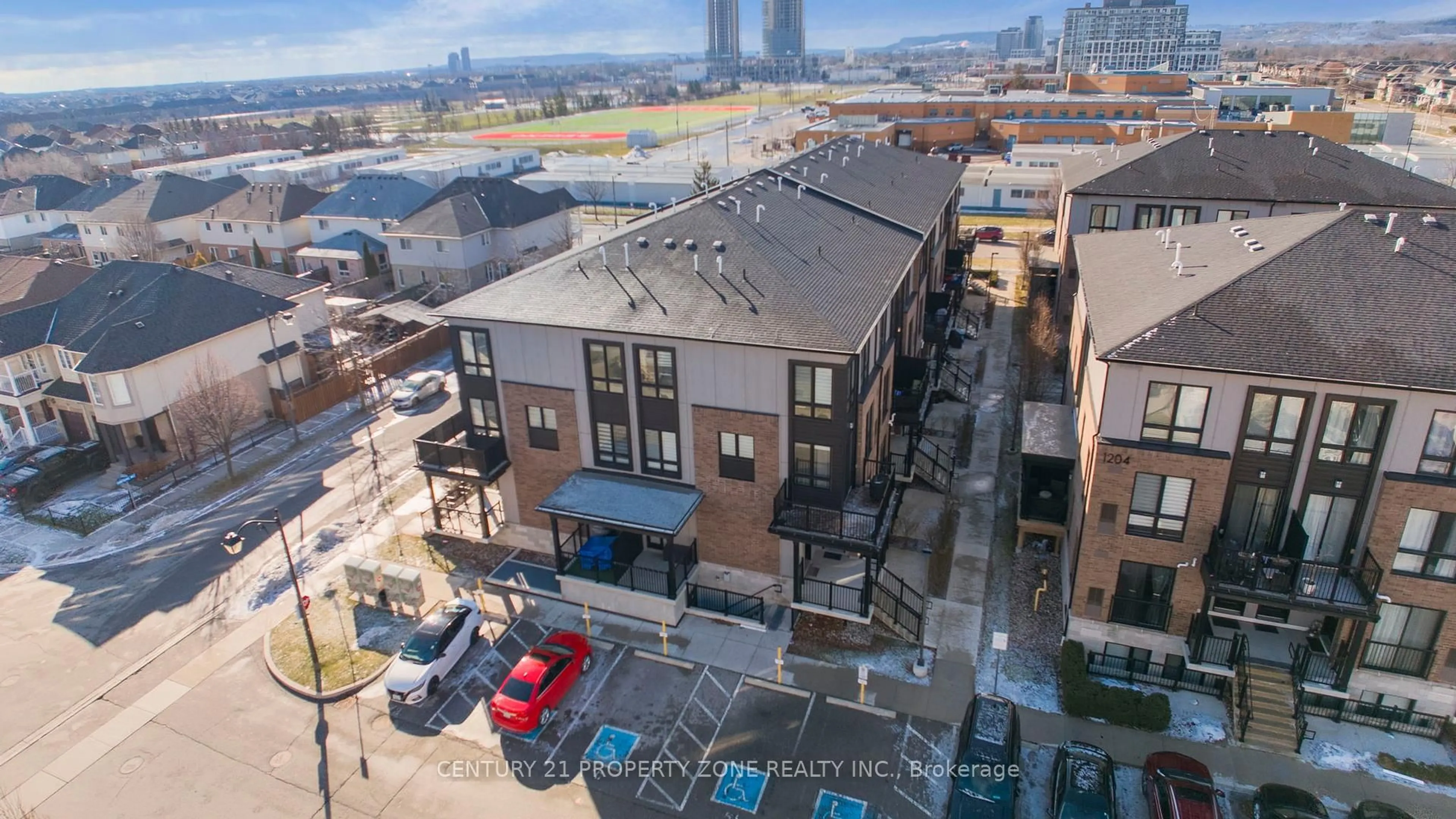 A pic from outside/outdoor area/front of a property/back of a property/a pic from drone, city buildings view from balcony for 1206 Main St #110, Milton Ontario L9T 9K6