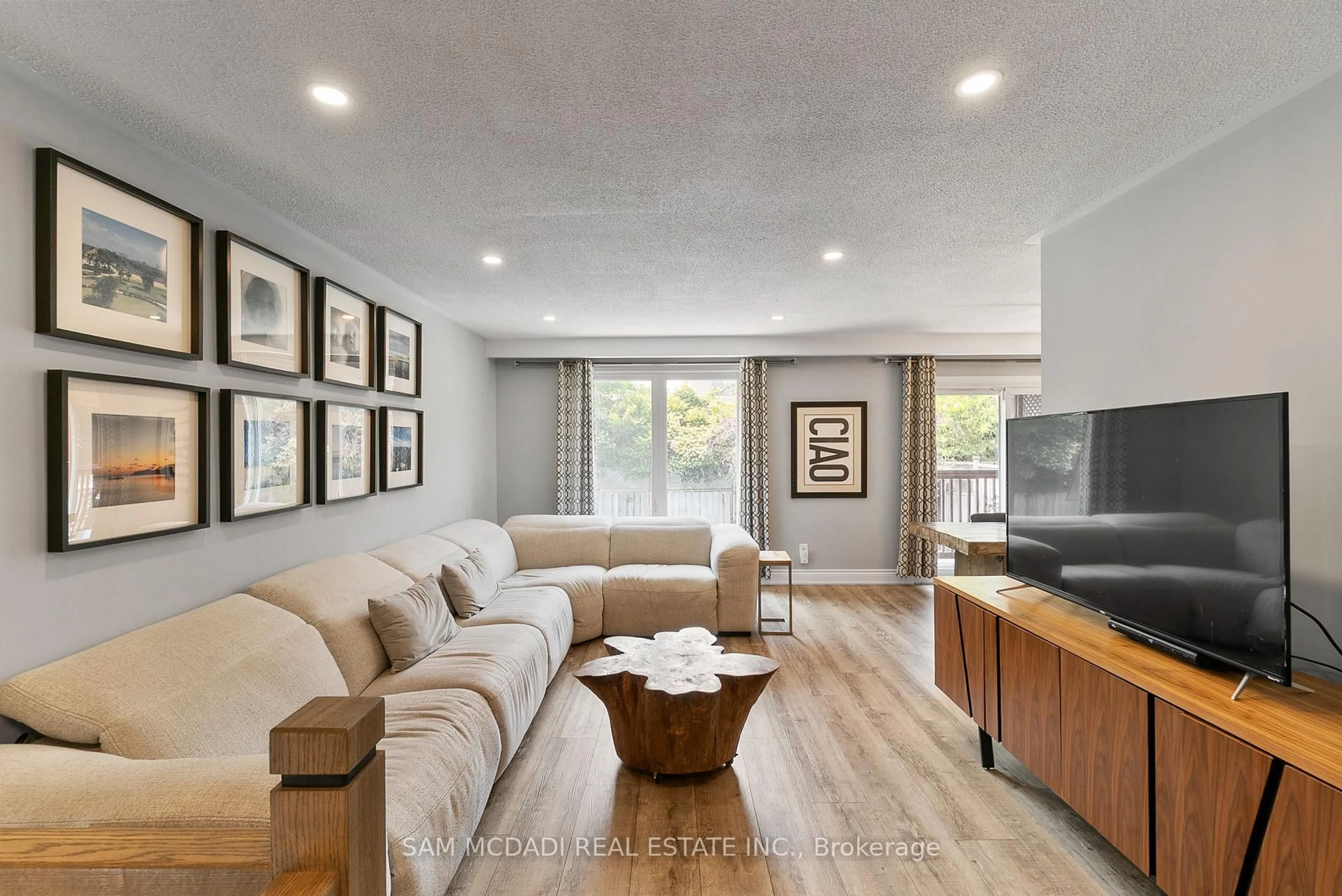 Living room with furniture, wood/laminate floor for 496 Seymour Dr, Oakville Ontario L6L 3K1