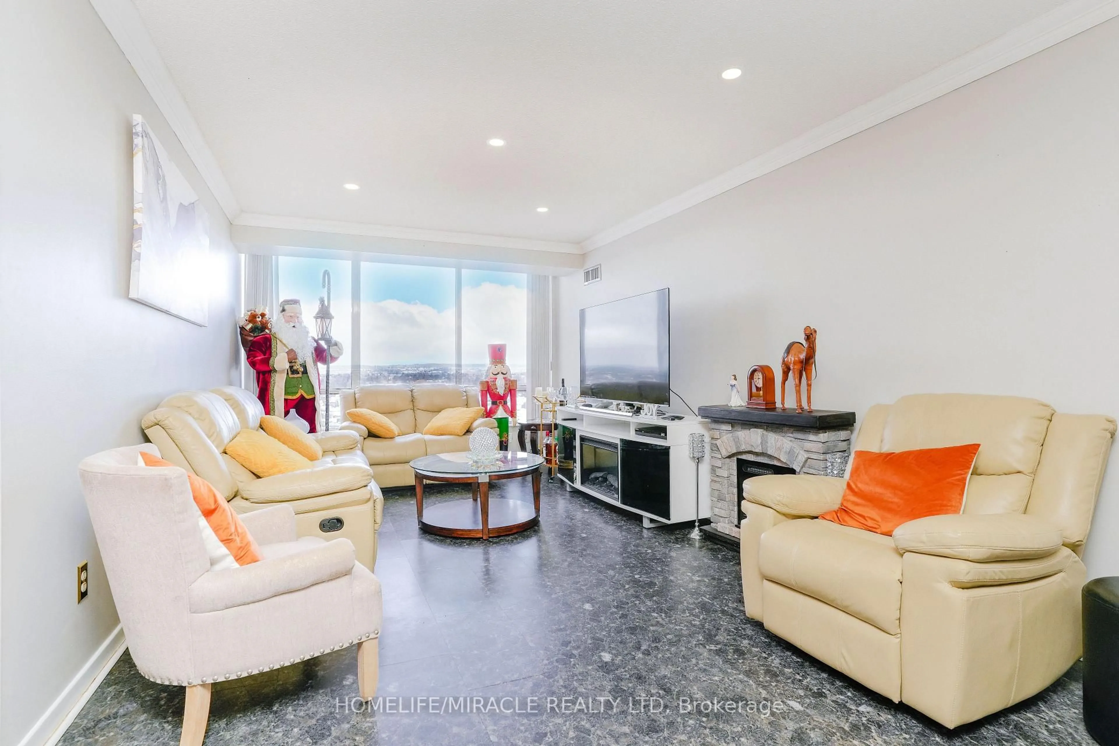 Living room with furniture, unknown for 26 Hanover Rd #1705, Brampton Ontario L6S 4T2