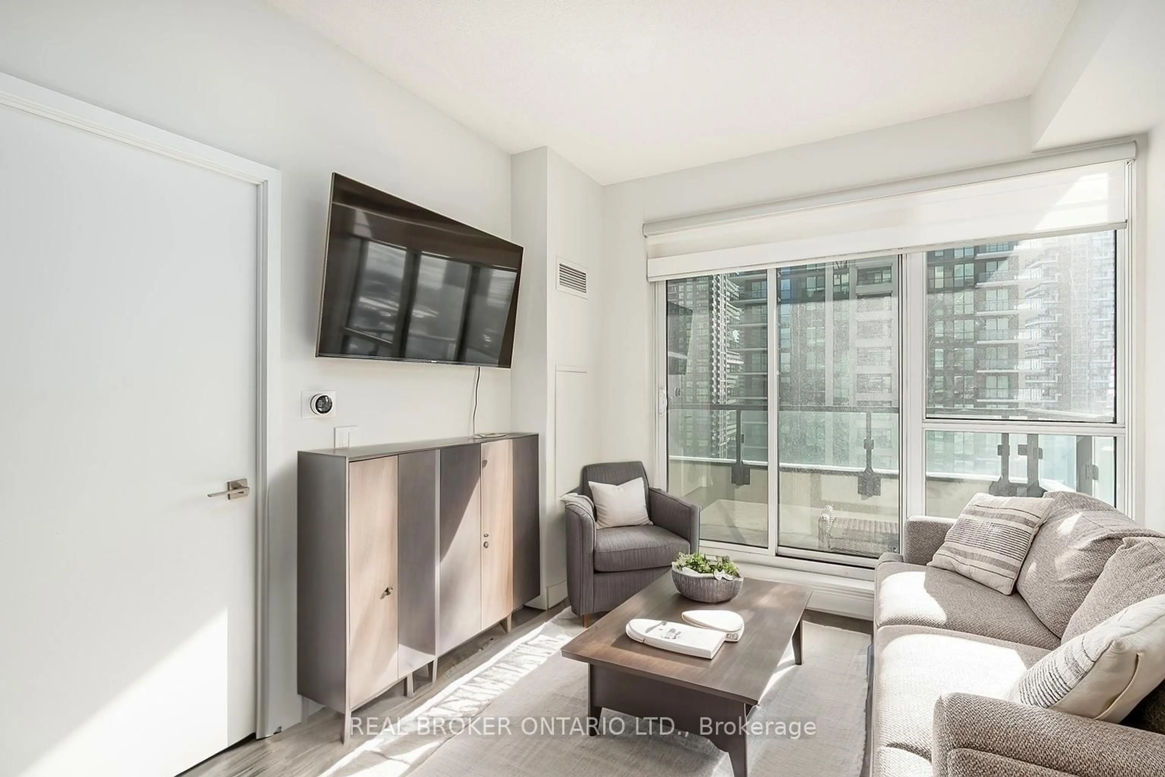 Living room with furniture, unknown for 4085 Parkside Village Dr #1808, Mississauga Ontario L5B 0K9