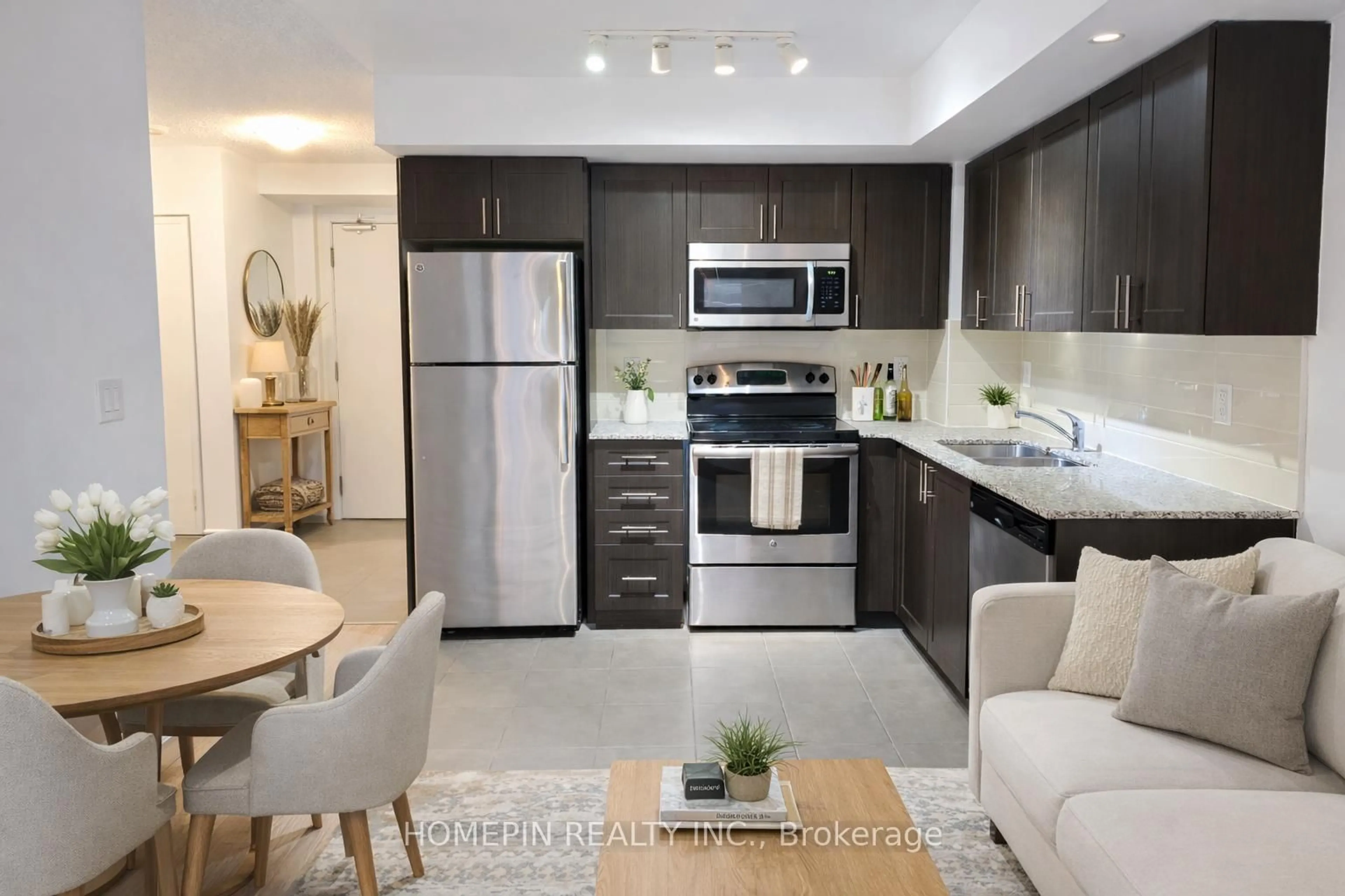 Open concept kitchen, ceramic/tile floor for 830 Lawrence Ave #523, Toronto Ontario M6A 0B6