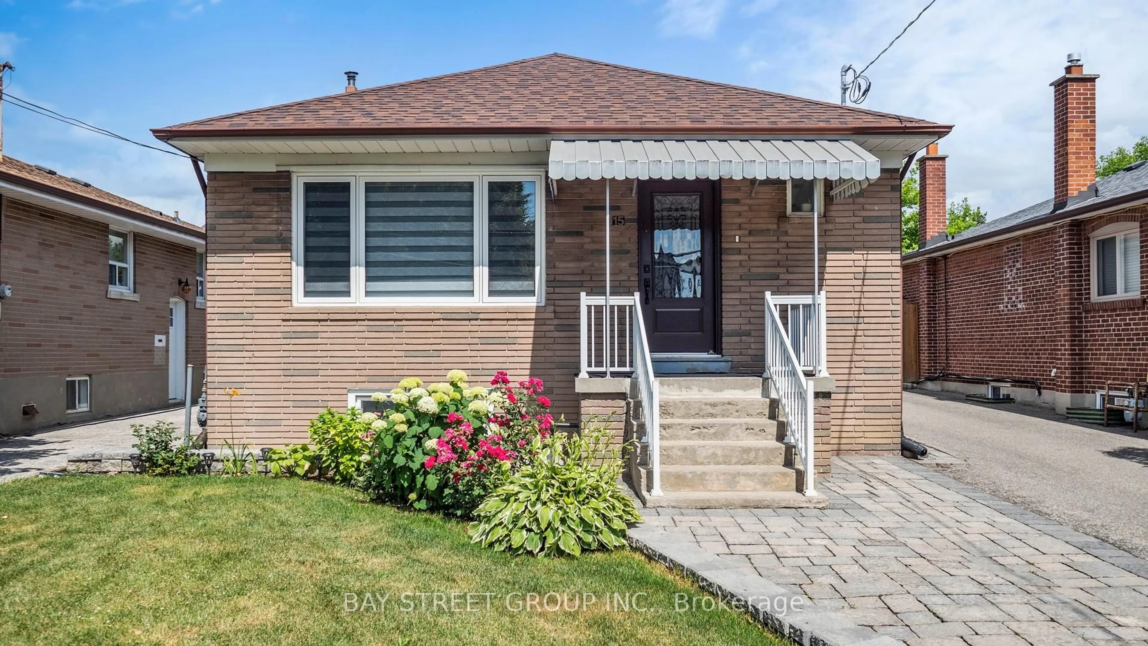 Home with brick exterior material, street for 15 Macleod St, Toronto Ontario M6L 2M7