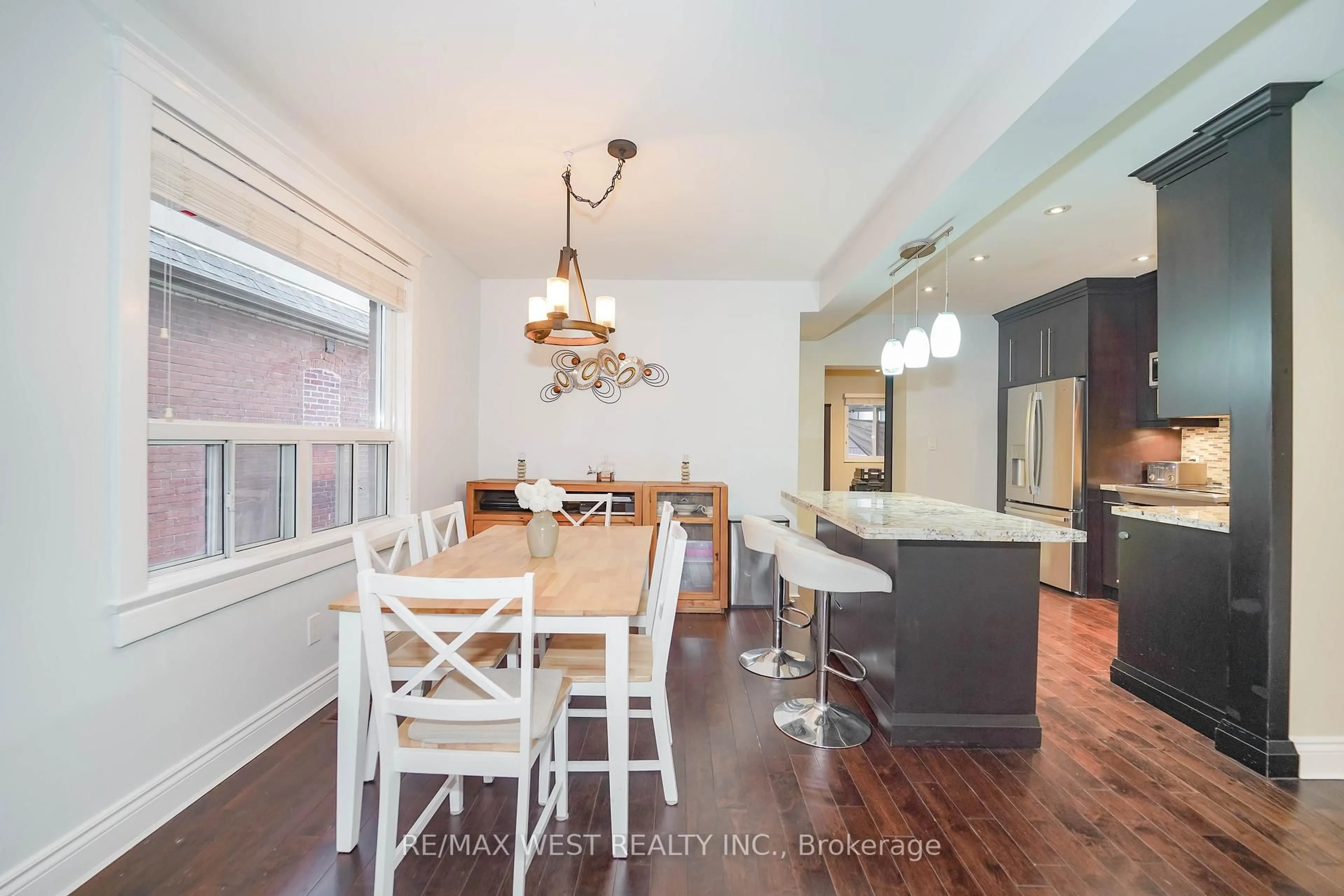 Open concept kitchen, wood/laminate floor for 26 Manitoba St, Toronto Ontario M8Y 1C7