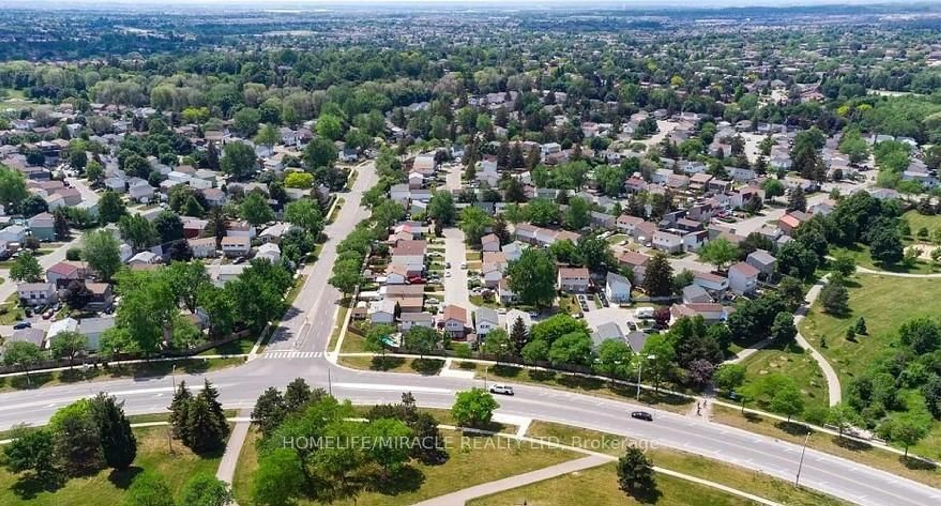 A pic from outside/outdoor area/front of a property/back of a property/a pic from drone, street for 12 Huckleberry Sq, Brampton Ontario L6S 1Y2