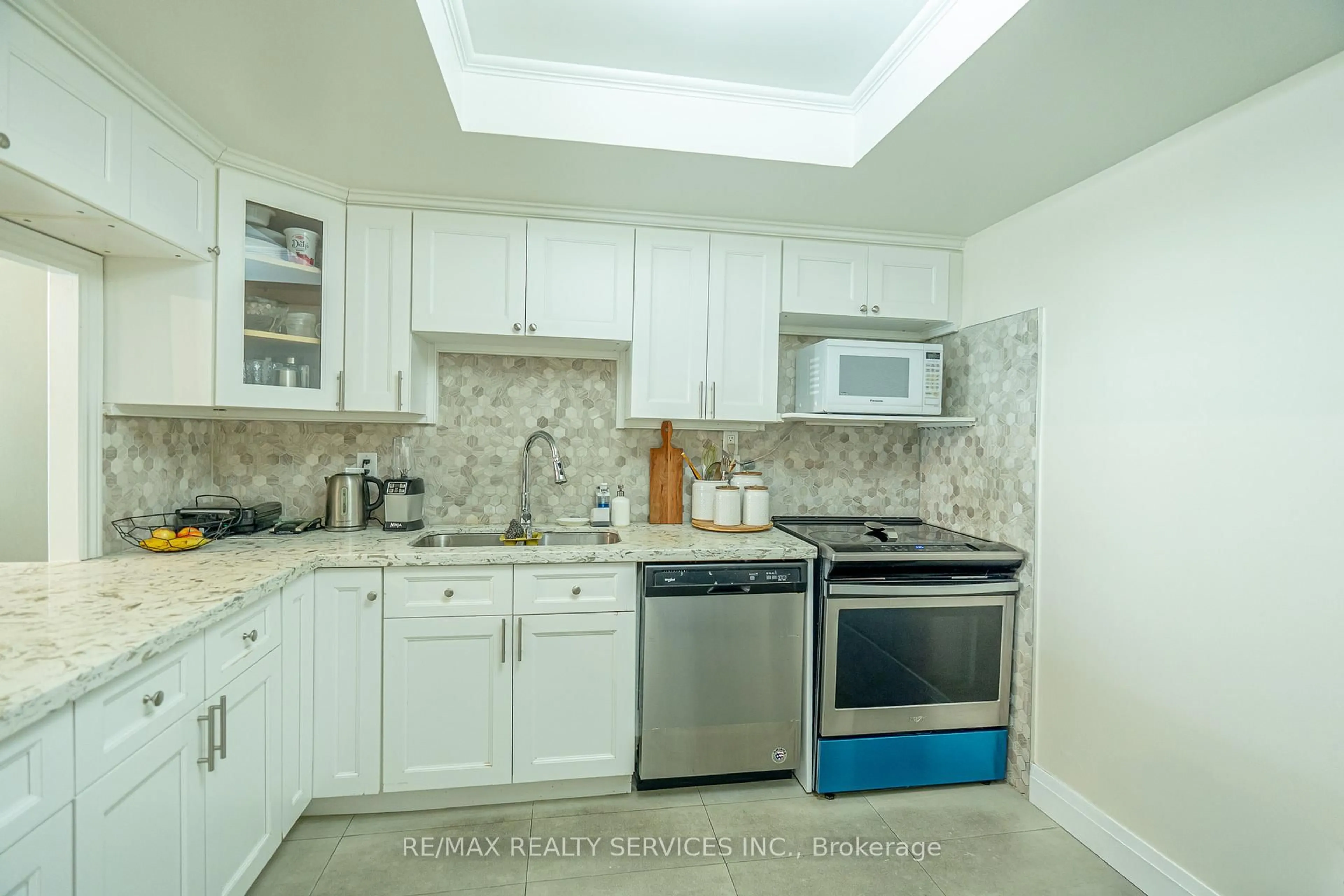 Standard kitchen, ceramic/tile floor for 8 Lisa St #203, Brampton Ontario L6T 4S6