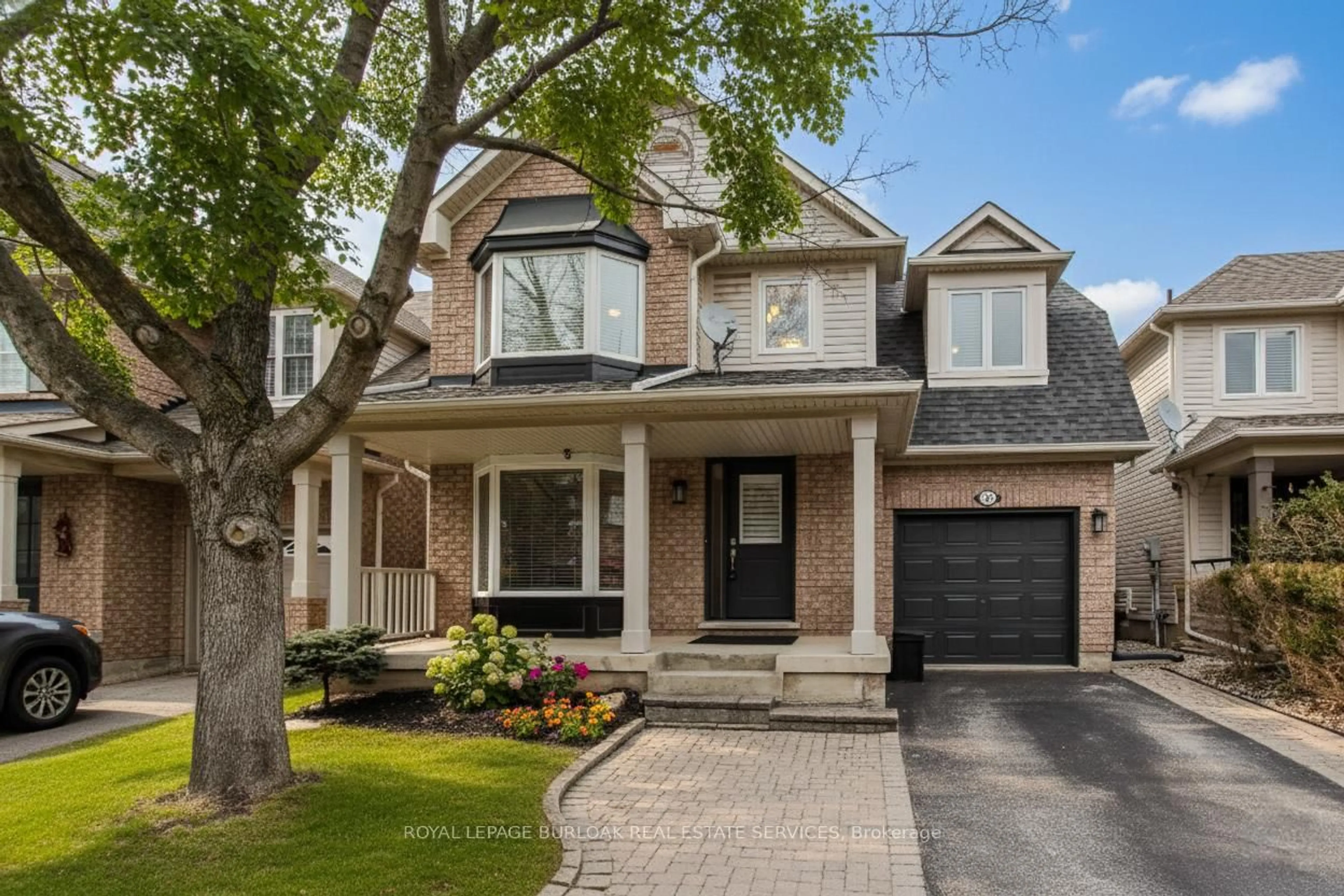 Home with brick exterior material, street for 2117 Dunmore Ave, Burlington Ontario L7L 6V8