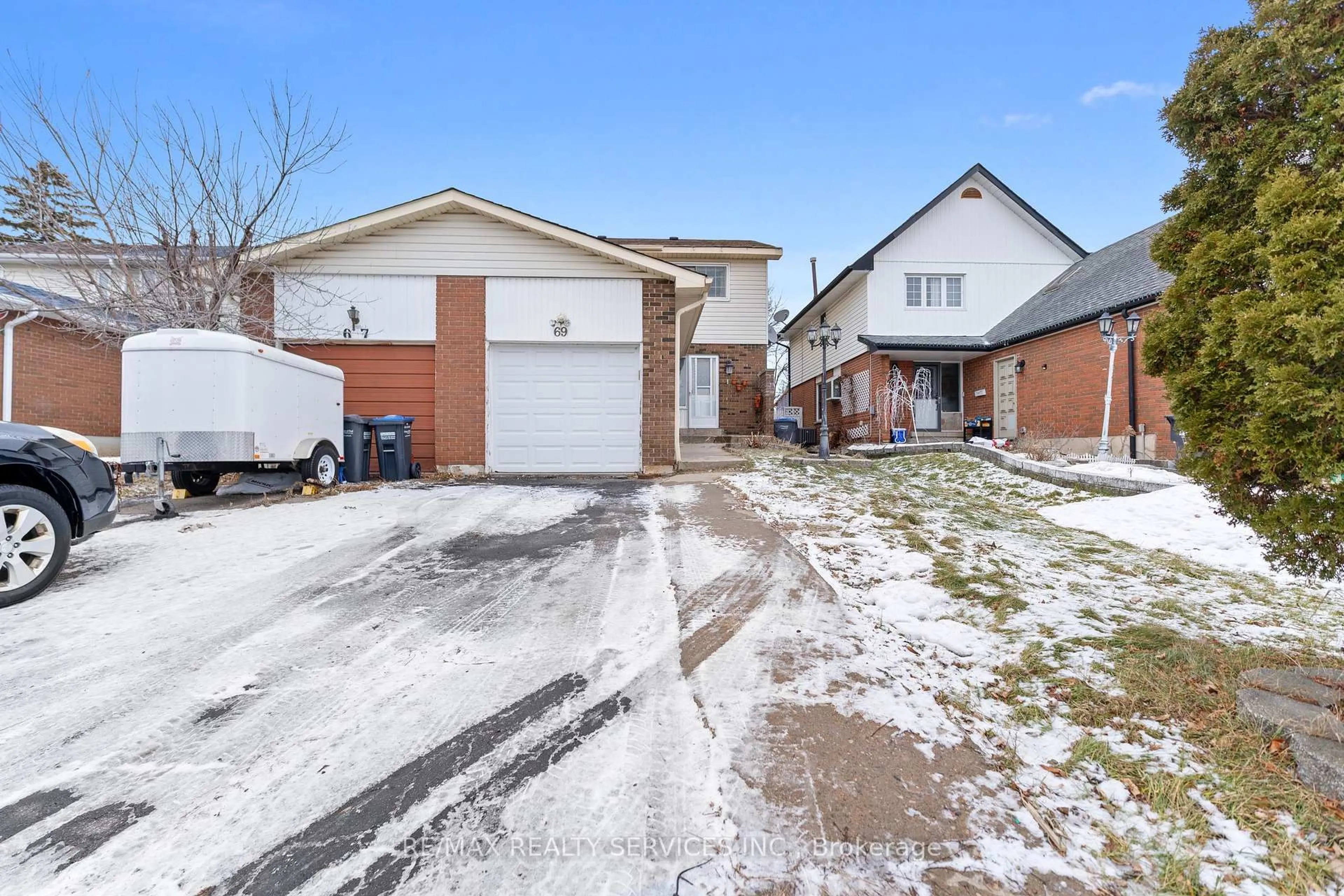 Home with brick exterior material, street for 69 Kingswood Dr, Brampton Ontario L6V 2X5