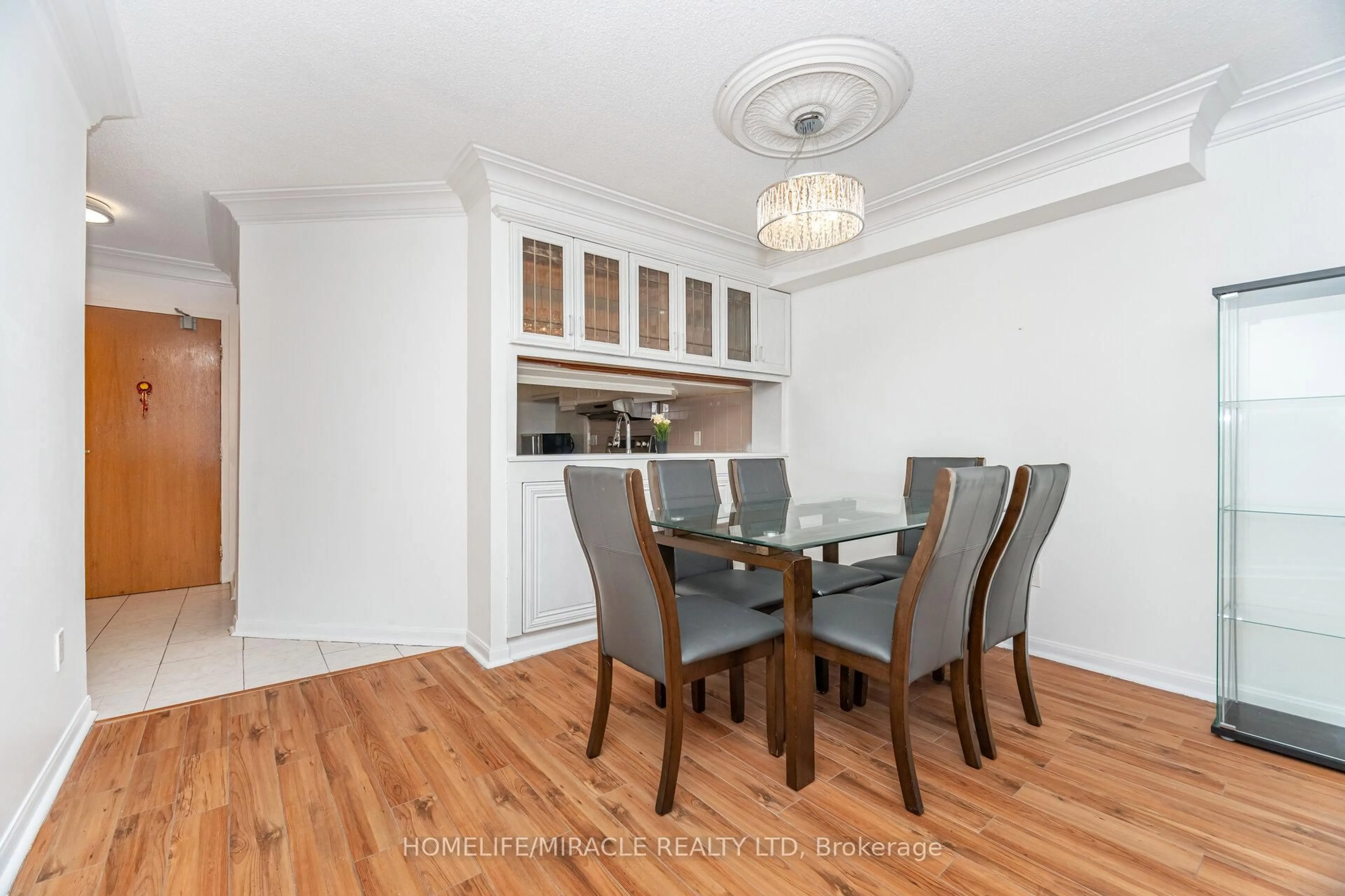 Dining room, wood/laminate floor for 236 Albion Rd #208, Toronto Ontario M9W 6A6