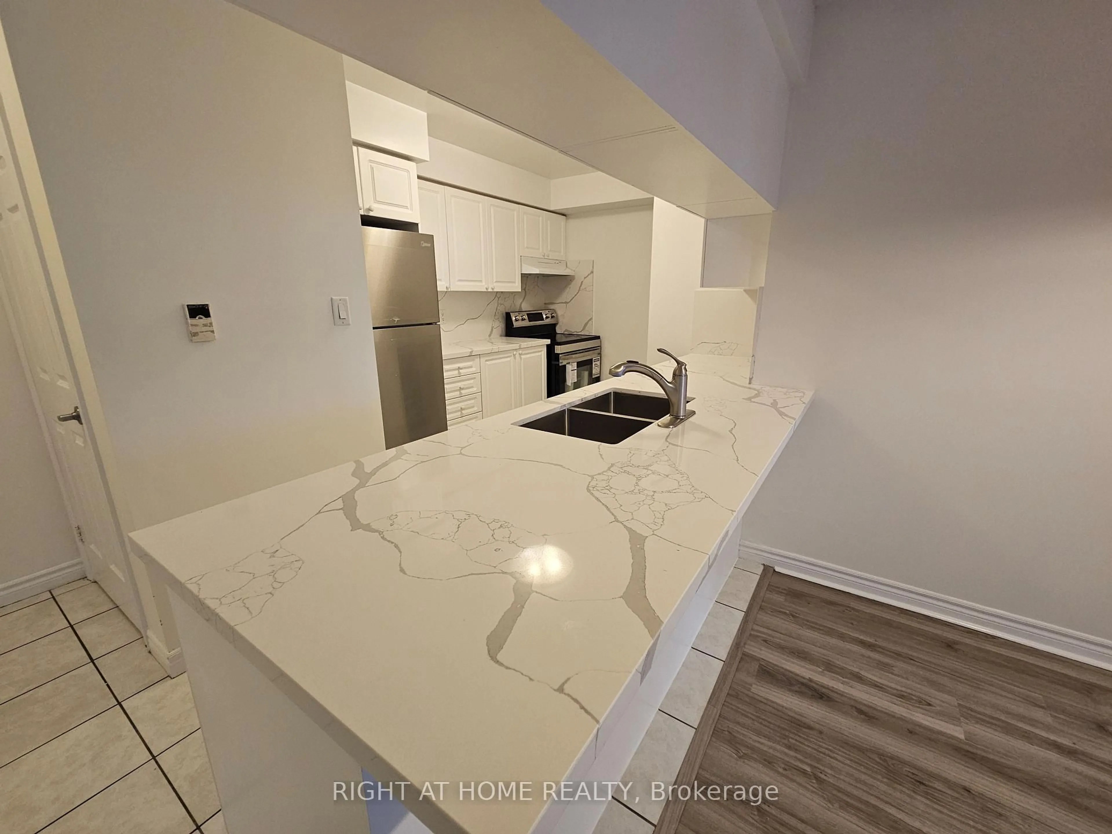 Open concept kitchen, unknown for 3880 Duke Of York Blvd #2318, Mississauga Ontario L5B 4M7