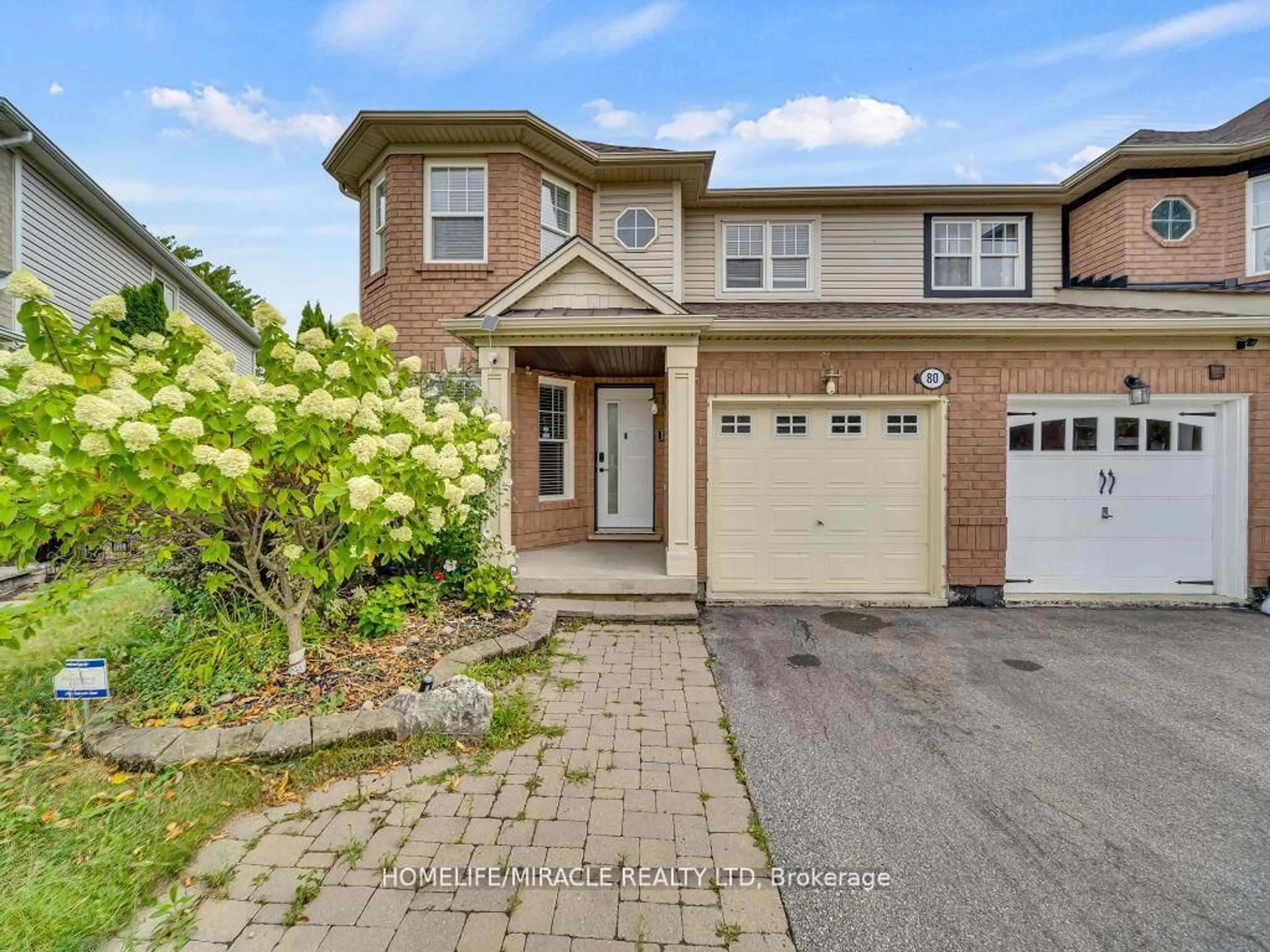 Home with brick exterior material, street for 80 Sweetwood Circ, Brampton Ontario L7A 2S1