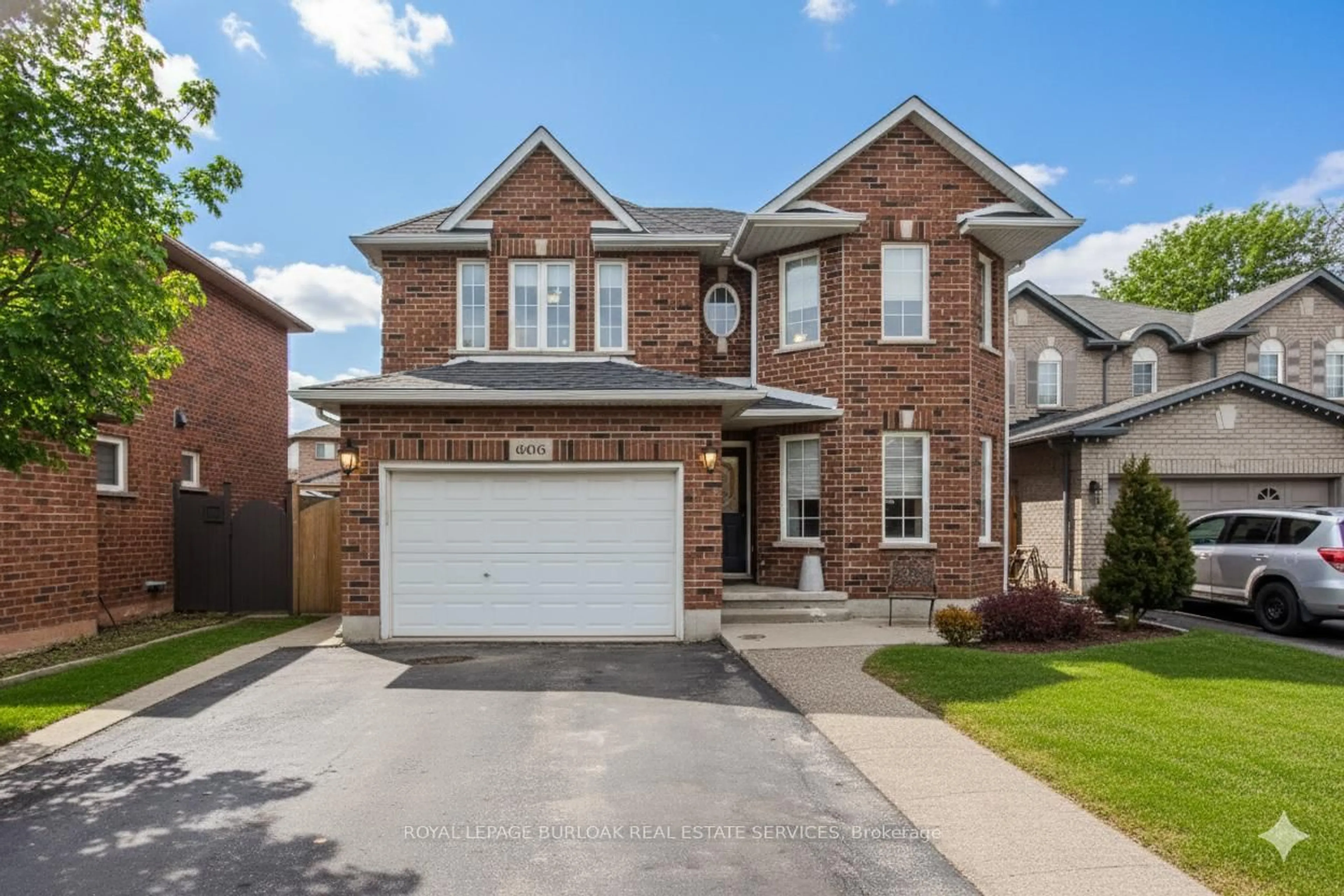 Home with brick exterior material, street for 606 Williamson Crt, Burlington Ontario L7S 2K6