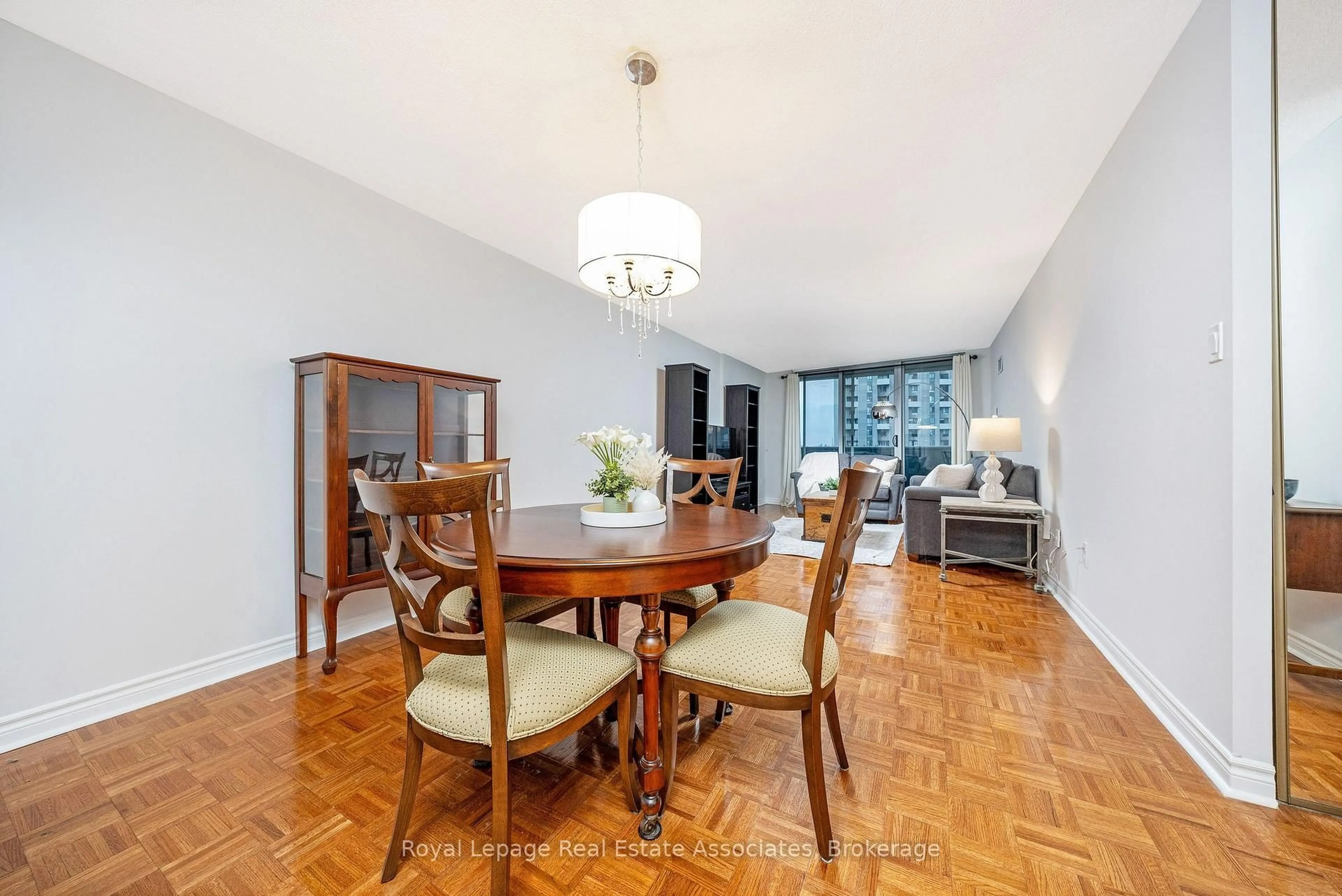 Dining room, wood/laminate floor for 299 Mill Rd #502, Toronto Ontario M9C 4V9