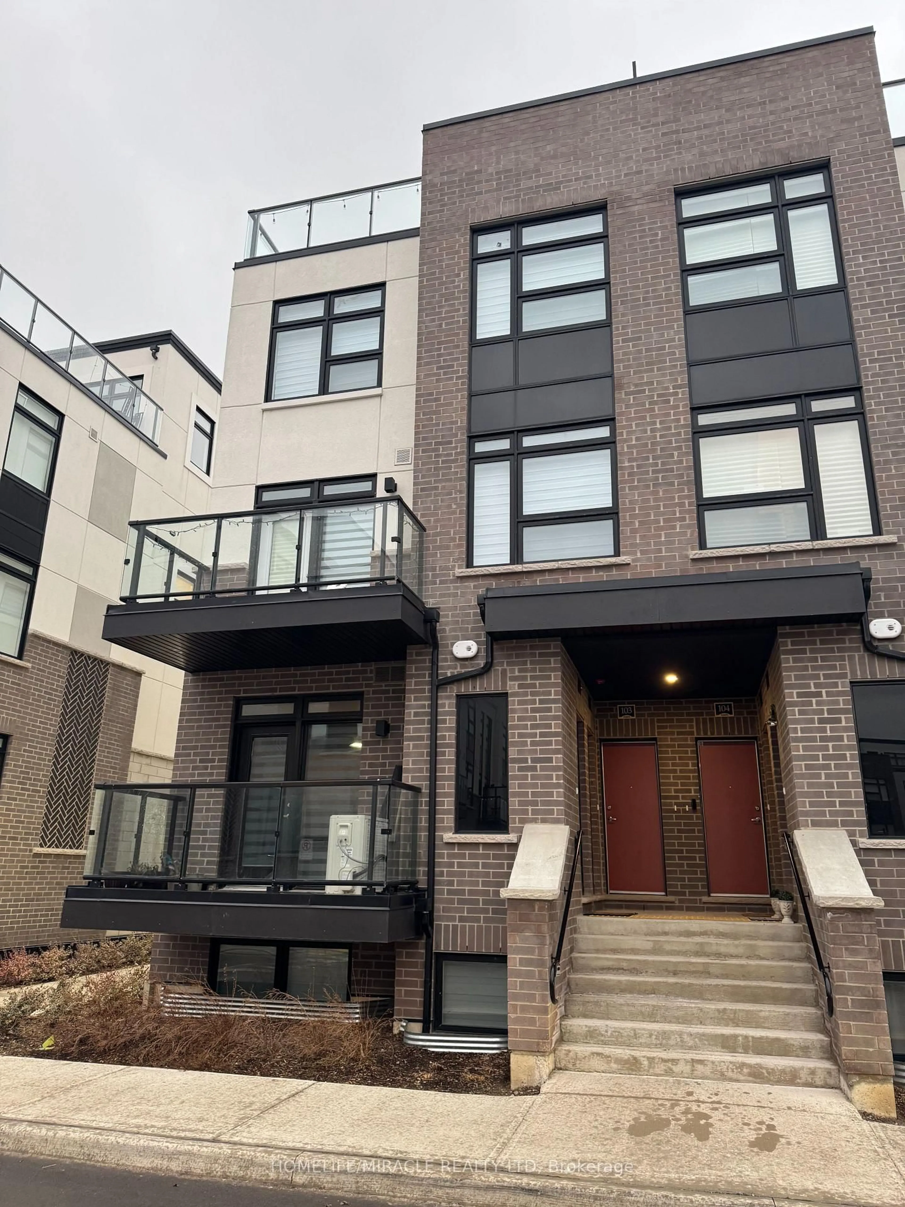 Home with brick exterior material, street for 1577 Rose Way #101, Milton Ontario L9E 1N4