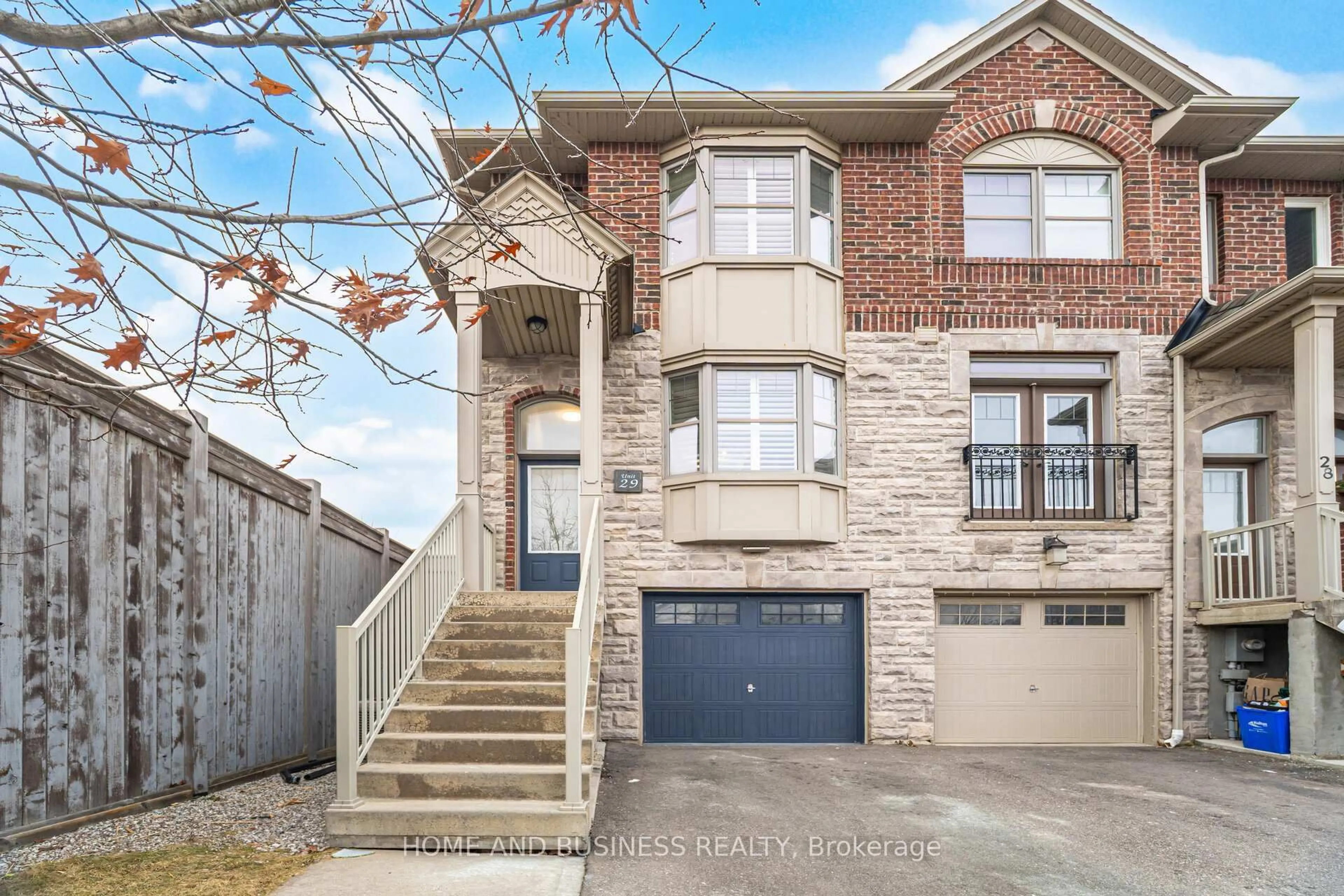 Home with brick exterior material, street for 2410 Woodstock Tr #29, Oakville Ontario L6M 0L3
