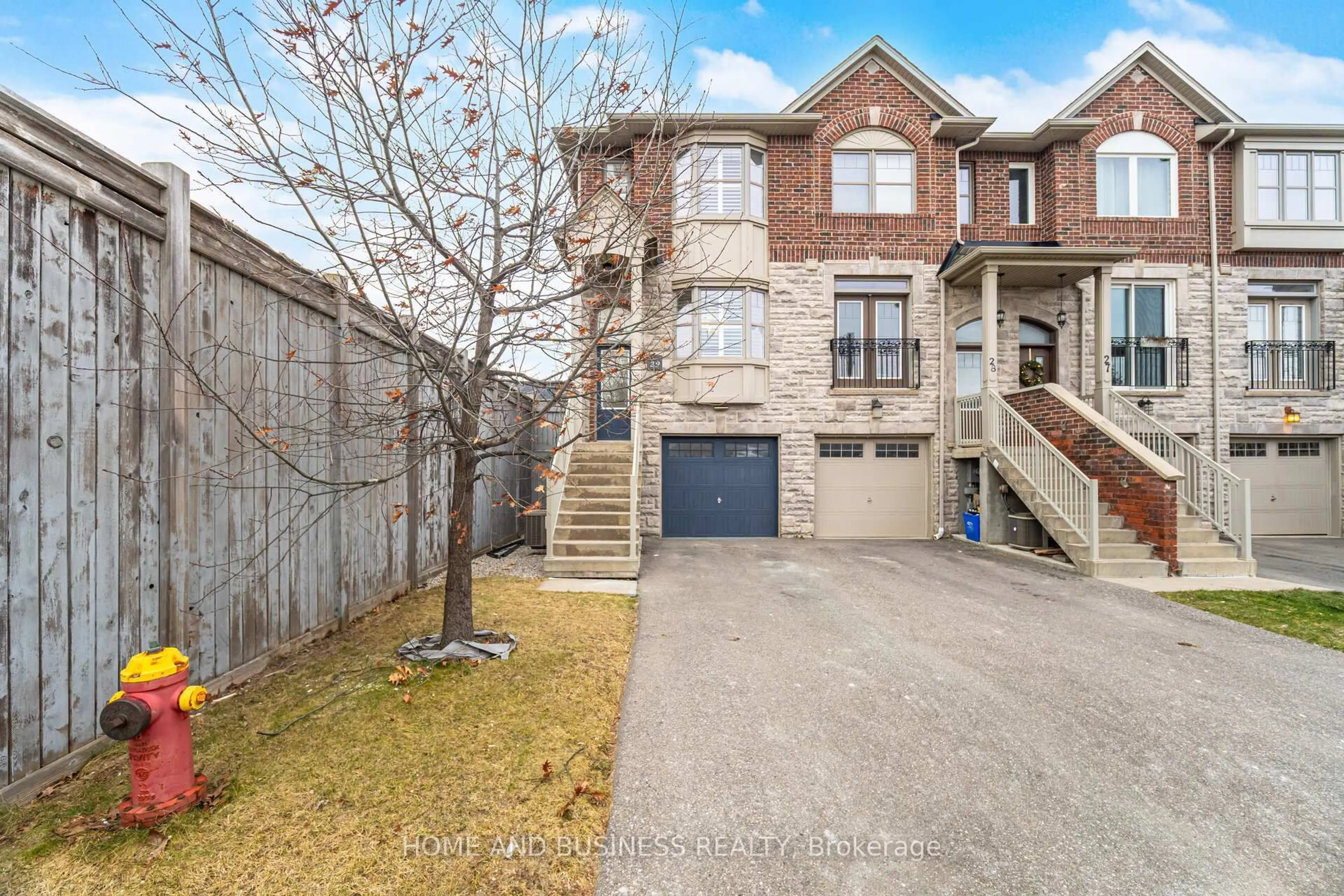 Home with brick exterior material, street for 2410 Woodstock Tr #29, Oakville Ontario L6M 0L3