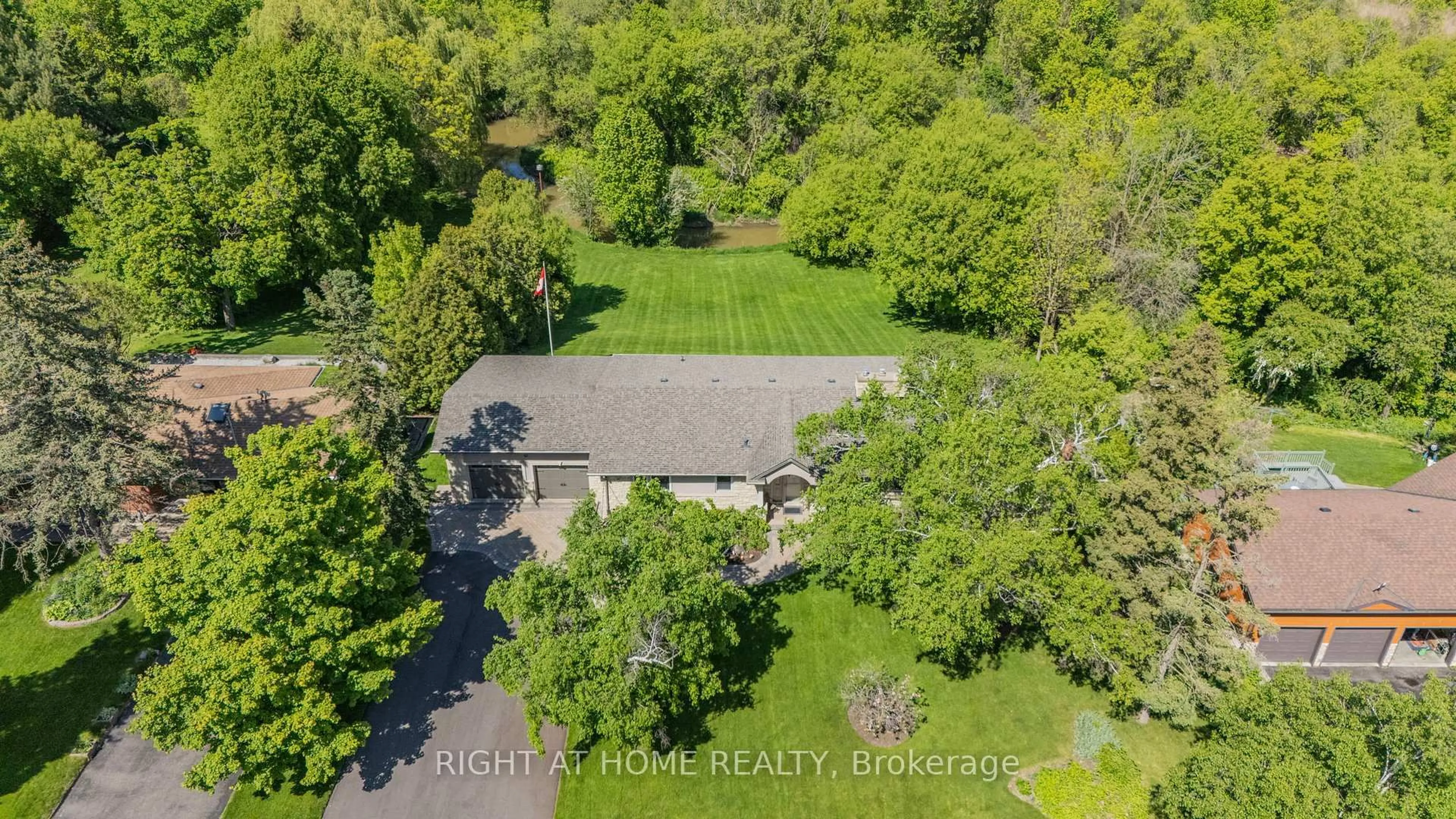 A pic from outside/outdoor area/front of a property/back of a property/a pic from drone, forest/trees view for 42 Valleyview Rd, Brampton Ontario L6Z 4P9