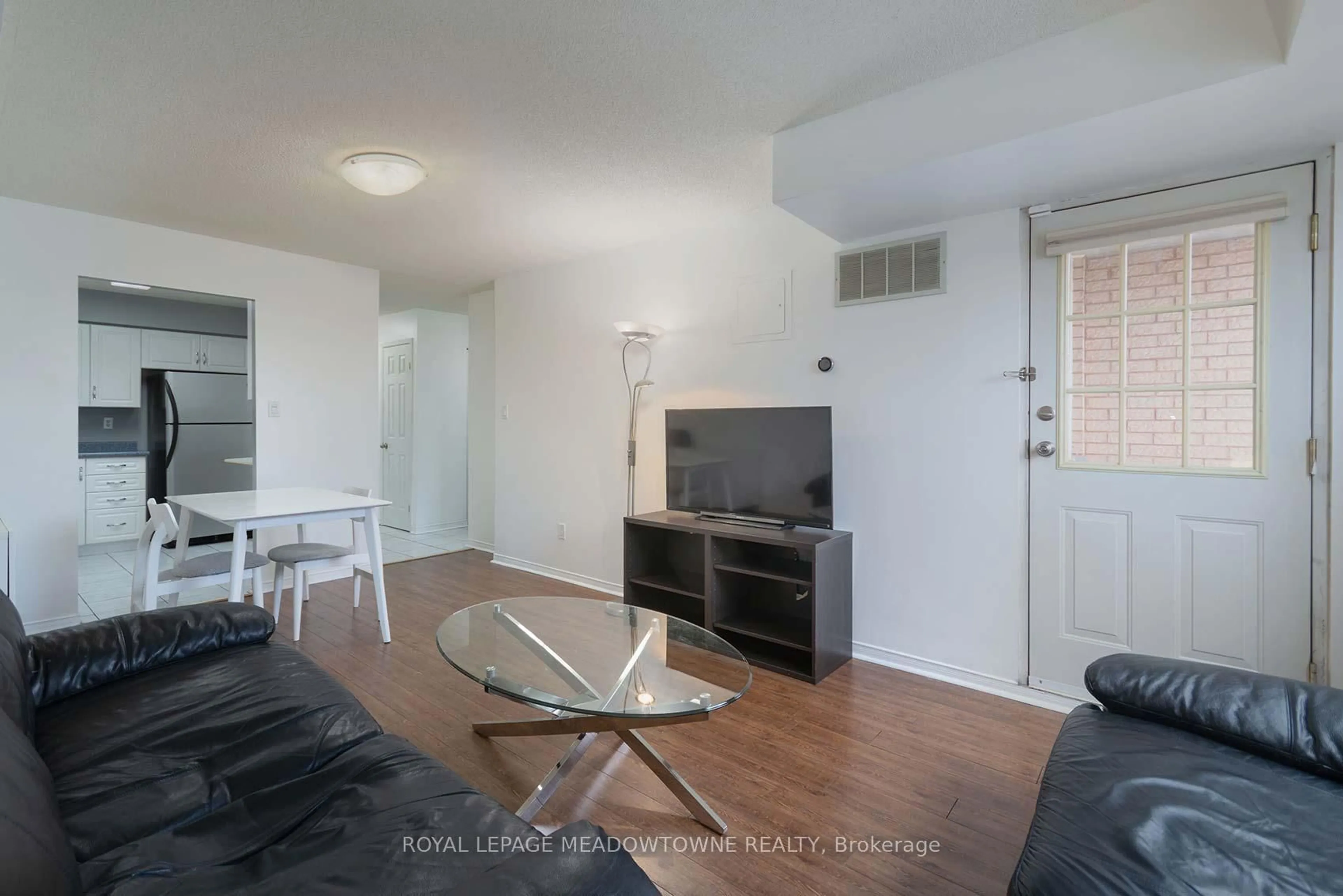 Living room with furniture, unknown for 32 Tannery St #404, Mississauga Ontario L5M 6T6