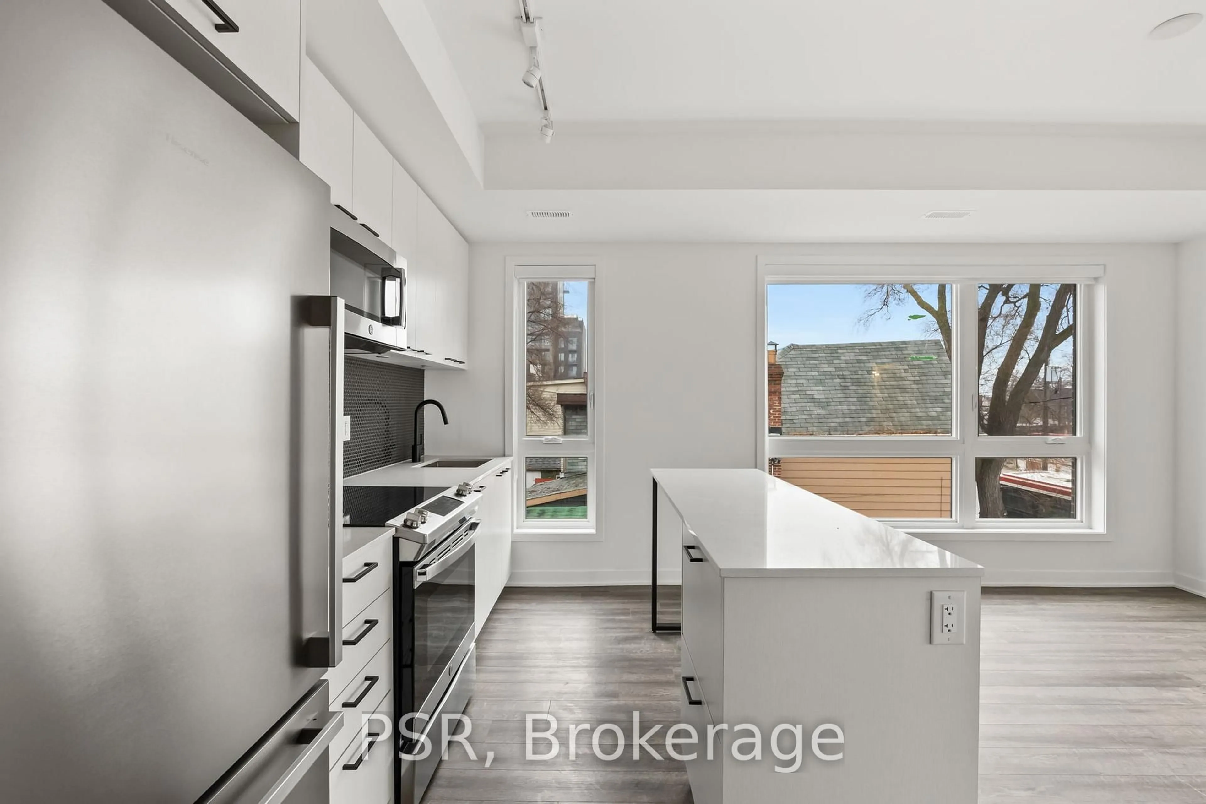 Open concept kitchen, unknown for 40 Ed Clark Gardens Blvd #TH13, Toronto Ontario M6N 0B5