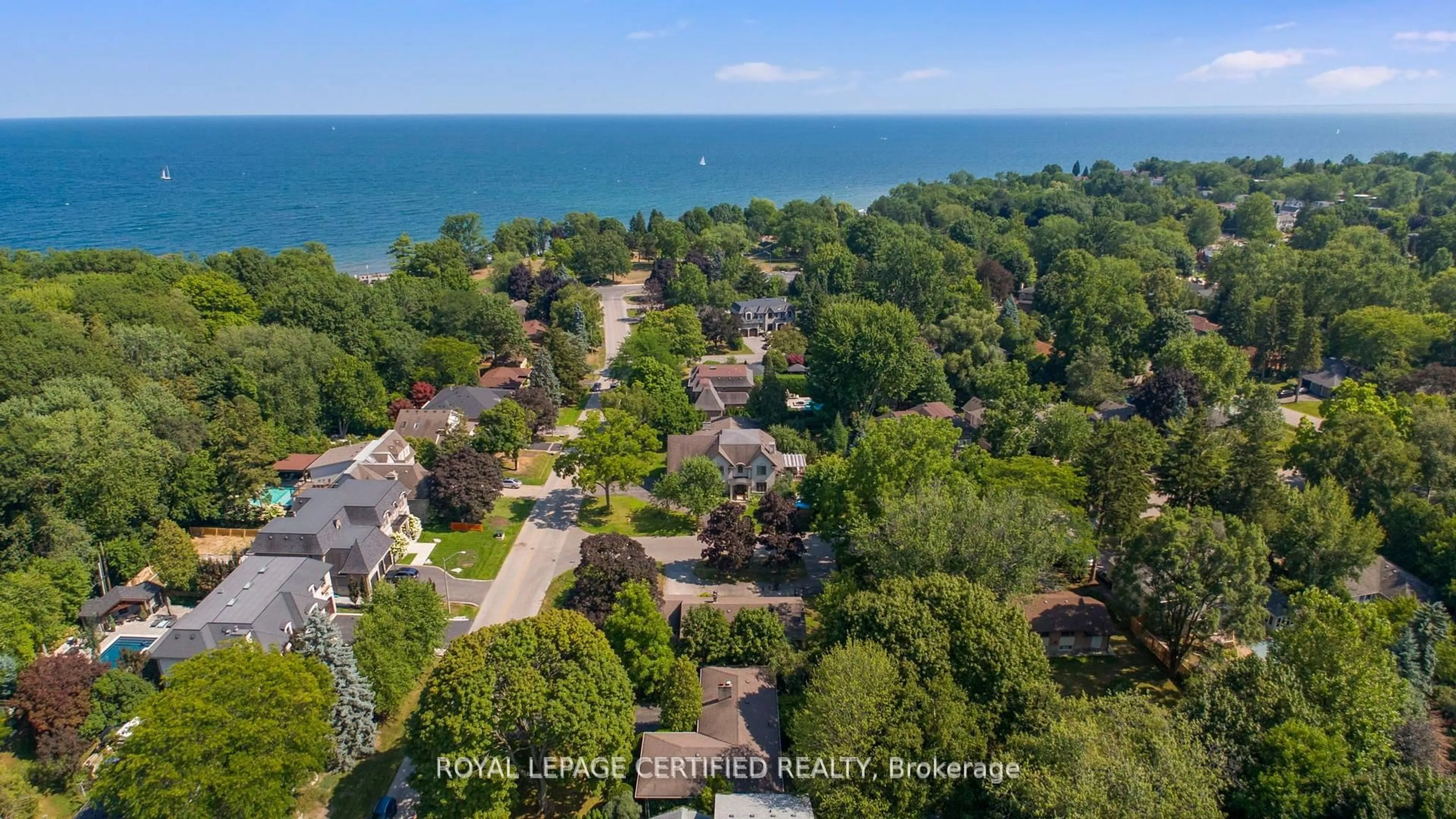 A pic from outside/outdoor area/front of a property/back of a property/a pic from drone, water/lake/river/ocean view for 122 Selgrove Cres, Oakville Ontario L6L 1L3