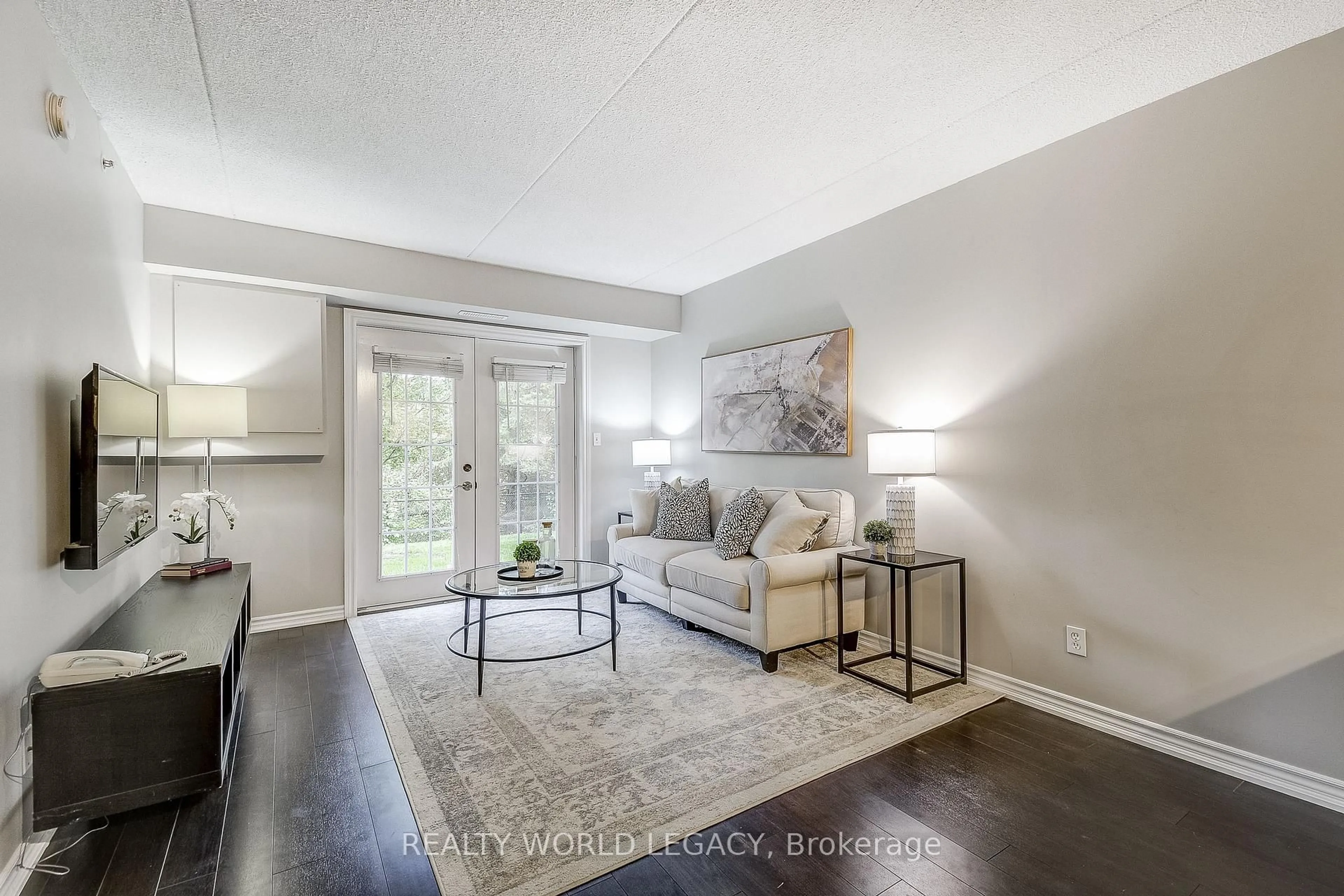 Living room with furniture, unknown for 2055 Appleby Line #103, Burlington Ontario L7L 7H1