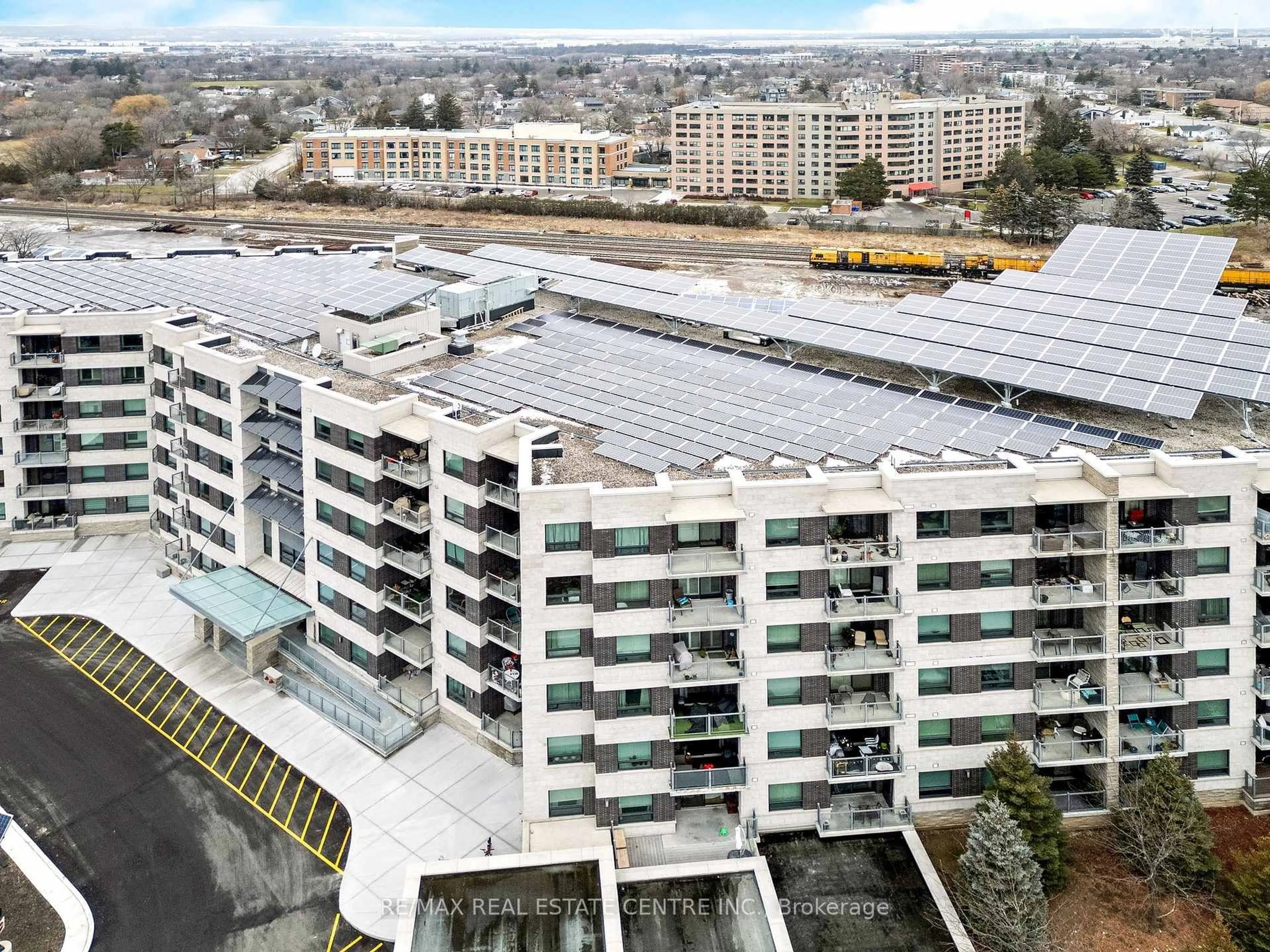 A pic from outside/outdoor area/front of a property/back of a property/a pic from drone, city buildings view from balcony for 383 Main St #216, Milton Ontario L9T 3K8