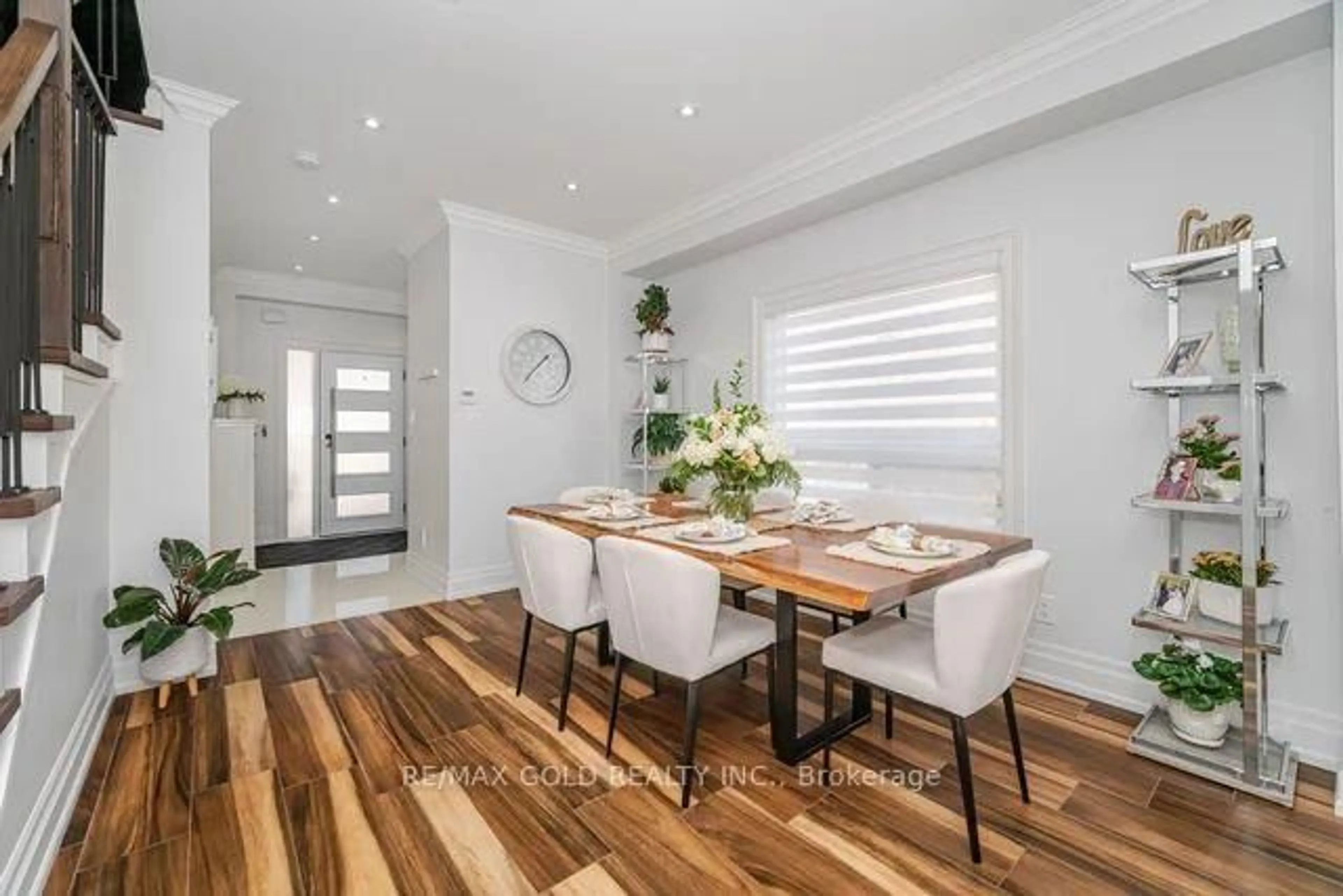 Dining room, wood/laminate floor for 10 Cloverlawn St, Brampton Ontario L7A 3X5