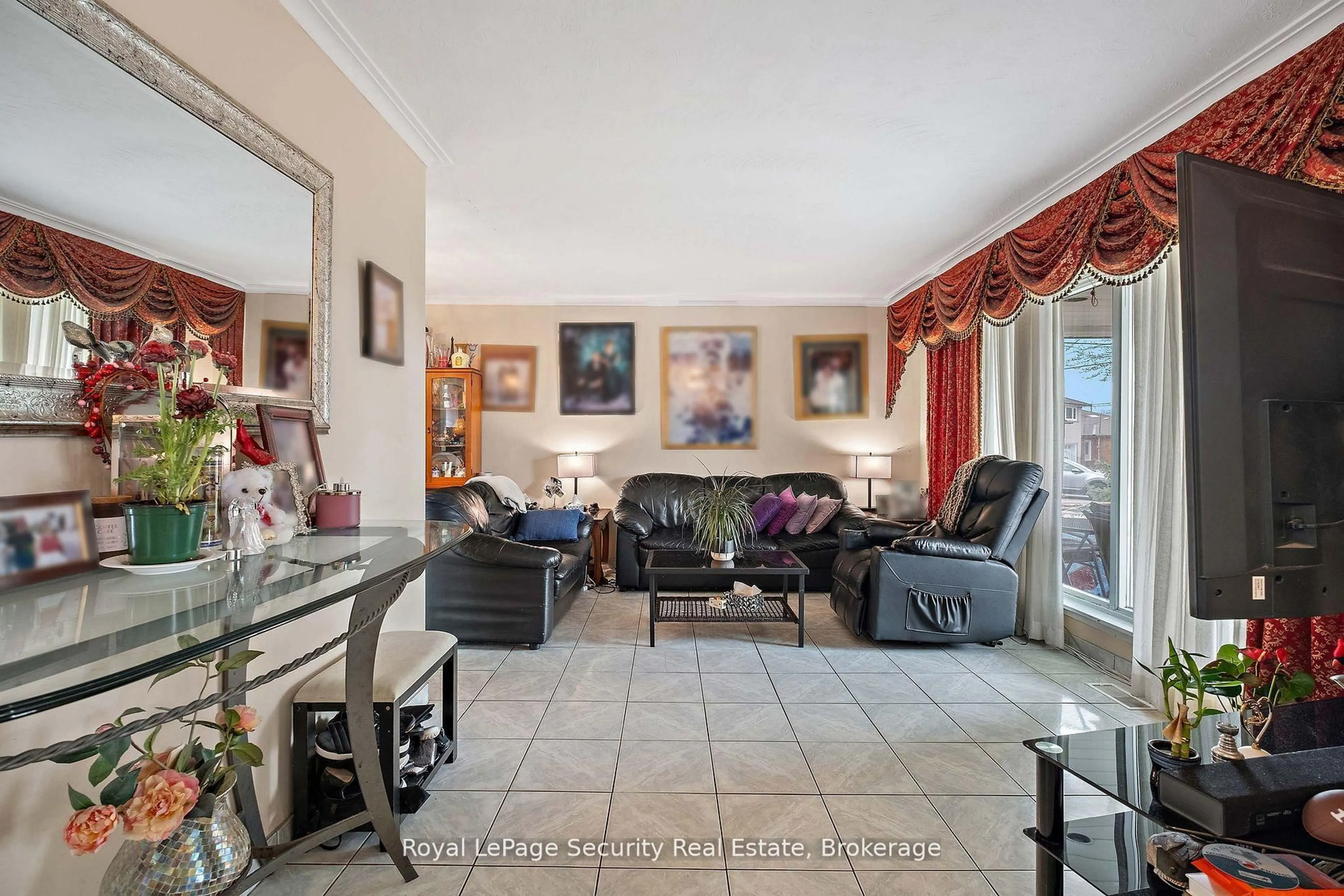 Living room with furniture, ceramic/tile floor for 27 Belleglade Crt, Toronto Ontario M9M 2W3