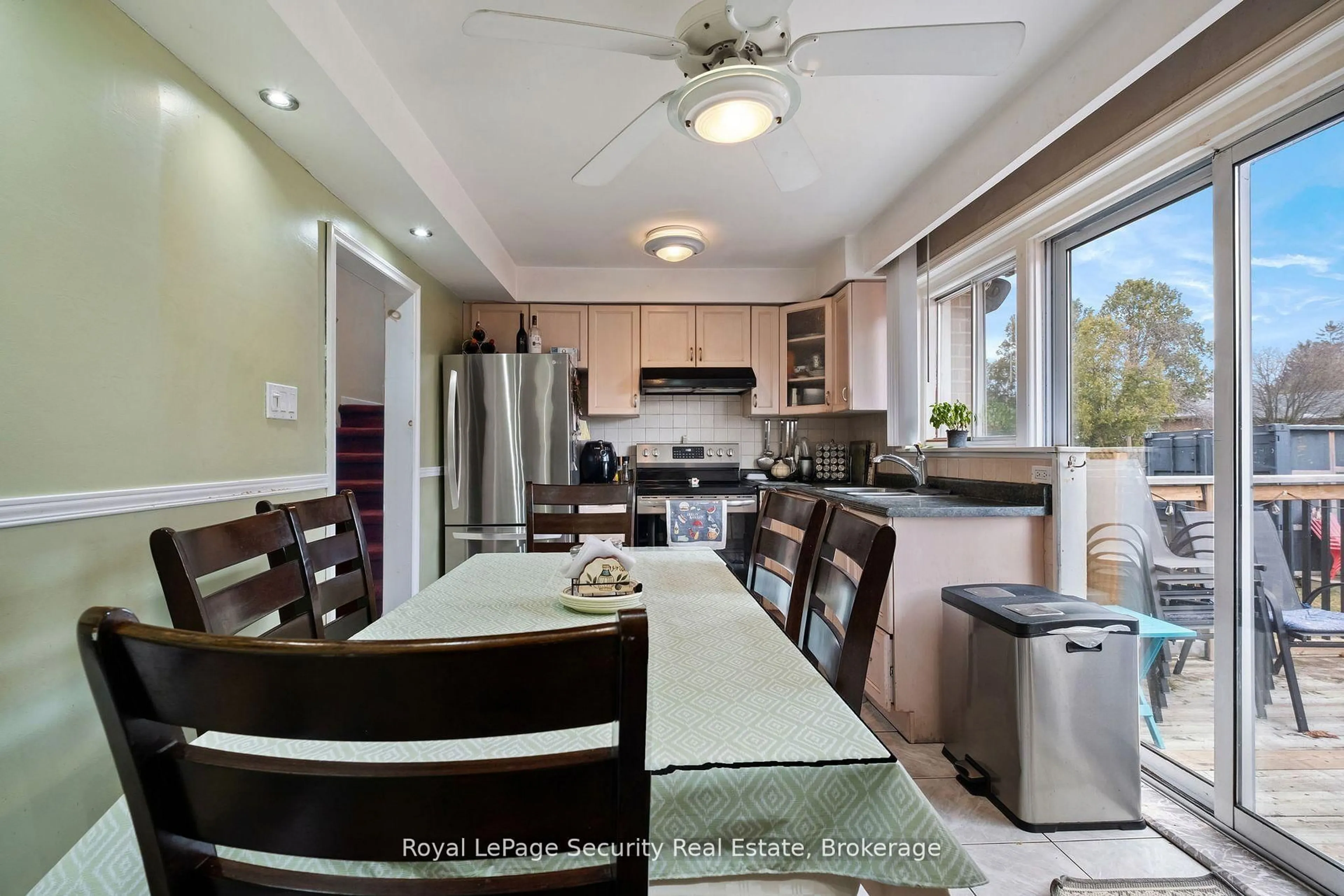 Open concept kitchen, ceramic/tile floor for 27 Belleglade Crt, Toronto Ontario M9M 2W3