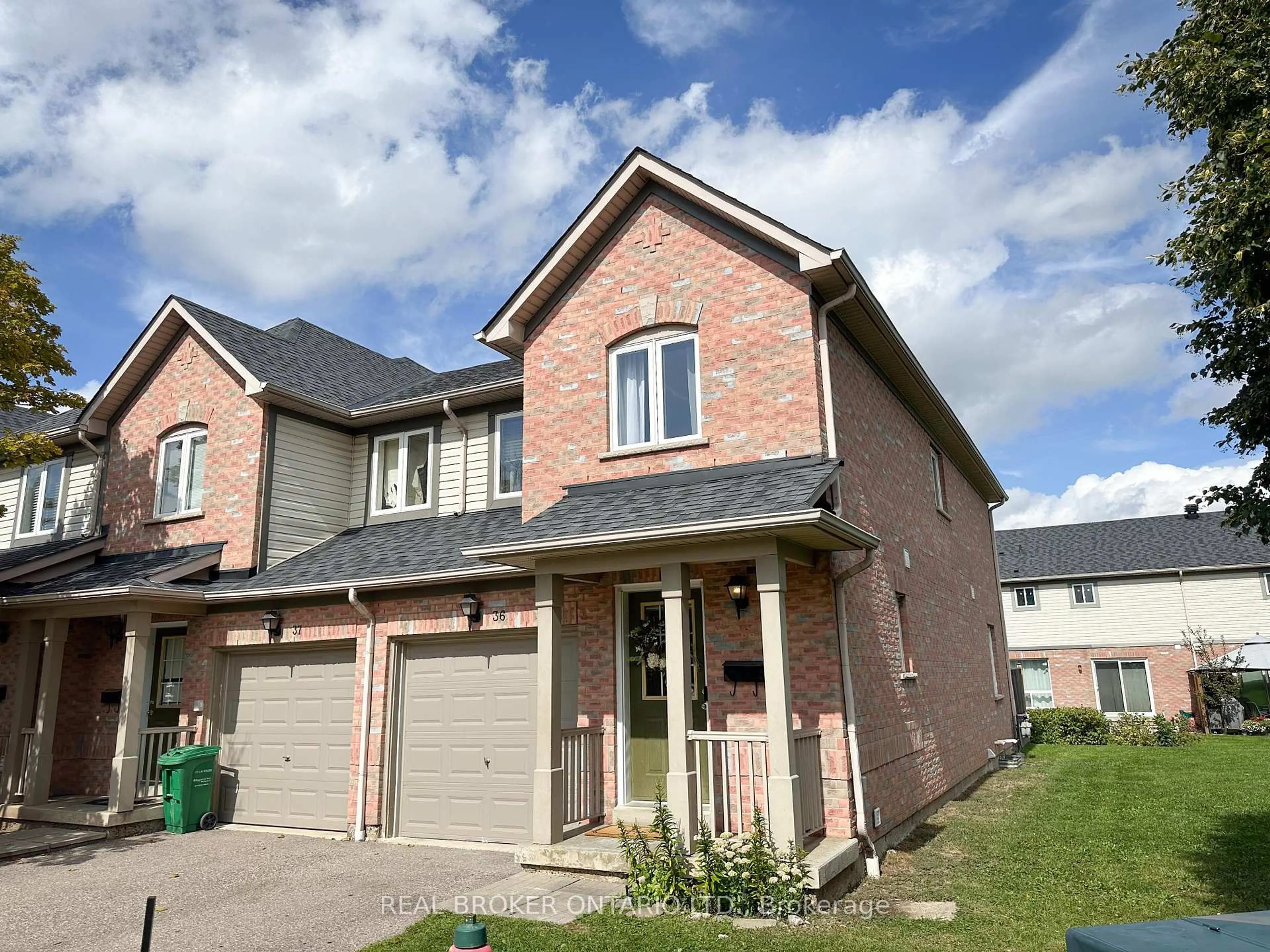 Home with brick exterior material, street for 5255 Guildwood Way #36, Mississauga Ontario L5R 4A7