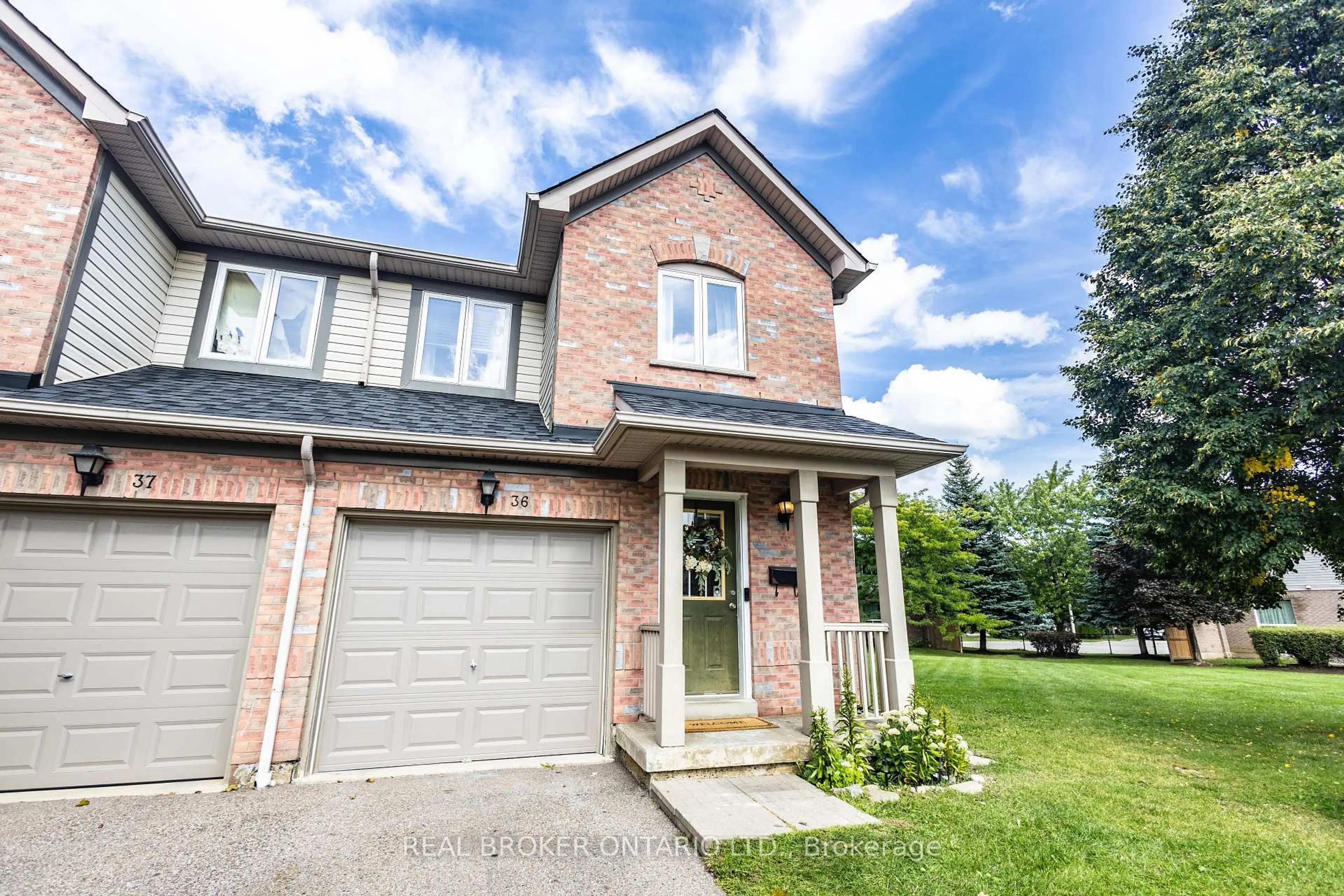 Home with brick exterior material, street for 5255 Guildwood Way #36, Mississauga Ontario L5R 4A7