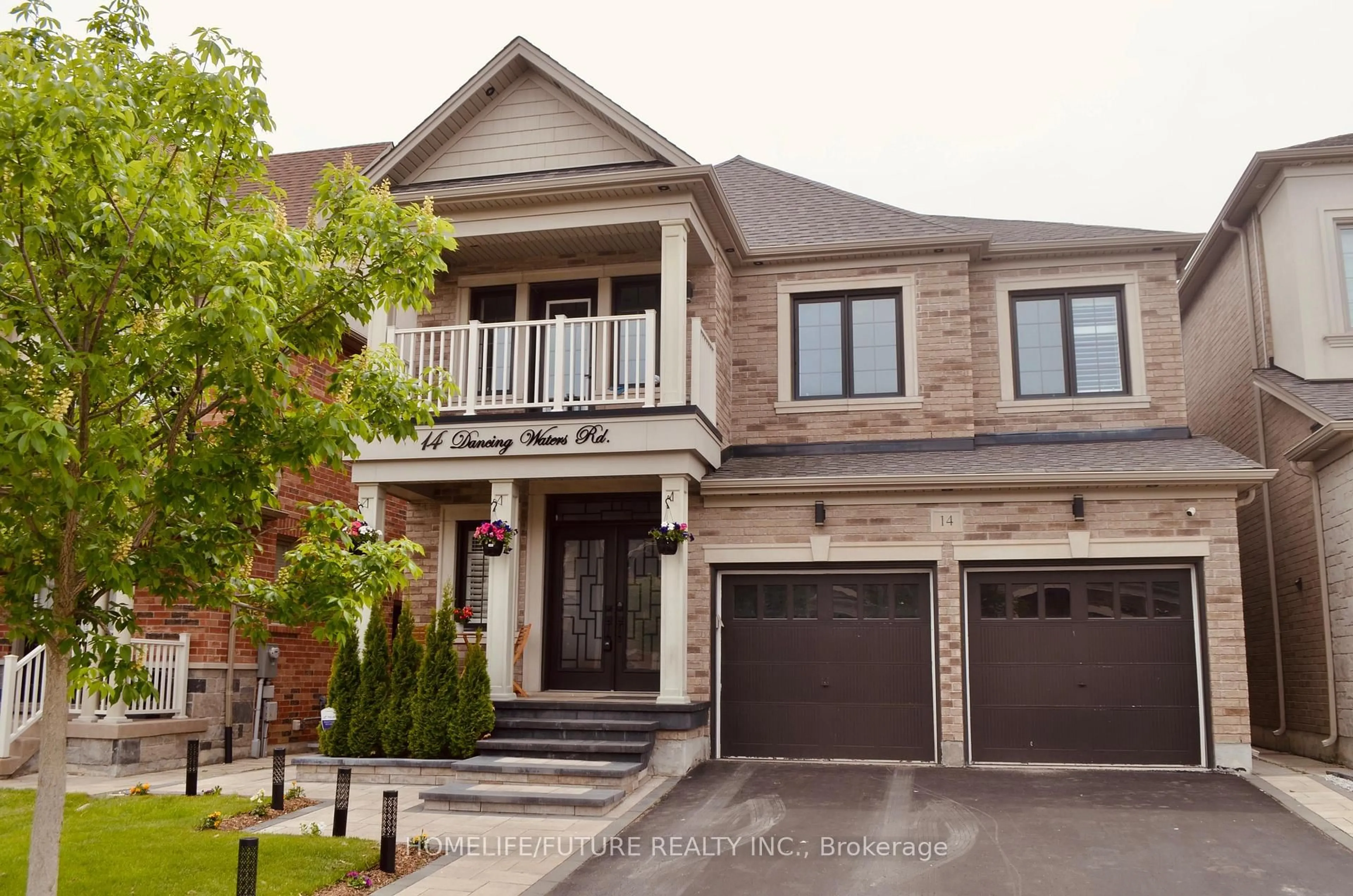 Home with brick exterior material, street for 14 Dancing Waters Rd, Brampton Ontario L6Y 6B5