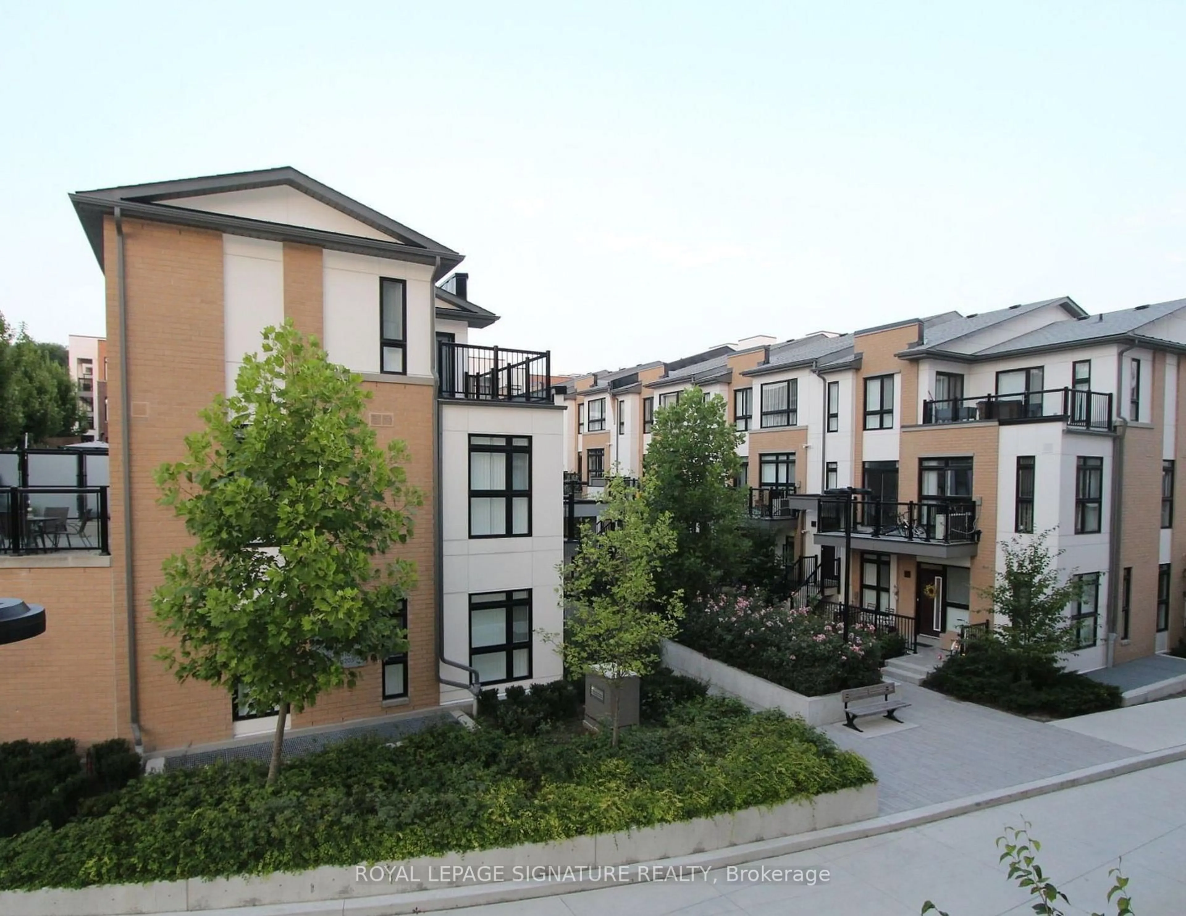 A pic from outside/outdoor area/front of a property/back of a property/a pic from drone, street for 160 Canon Jackson Dr #A105, Toronto Ontario M6M 0B6