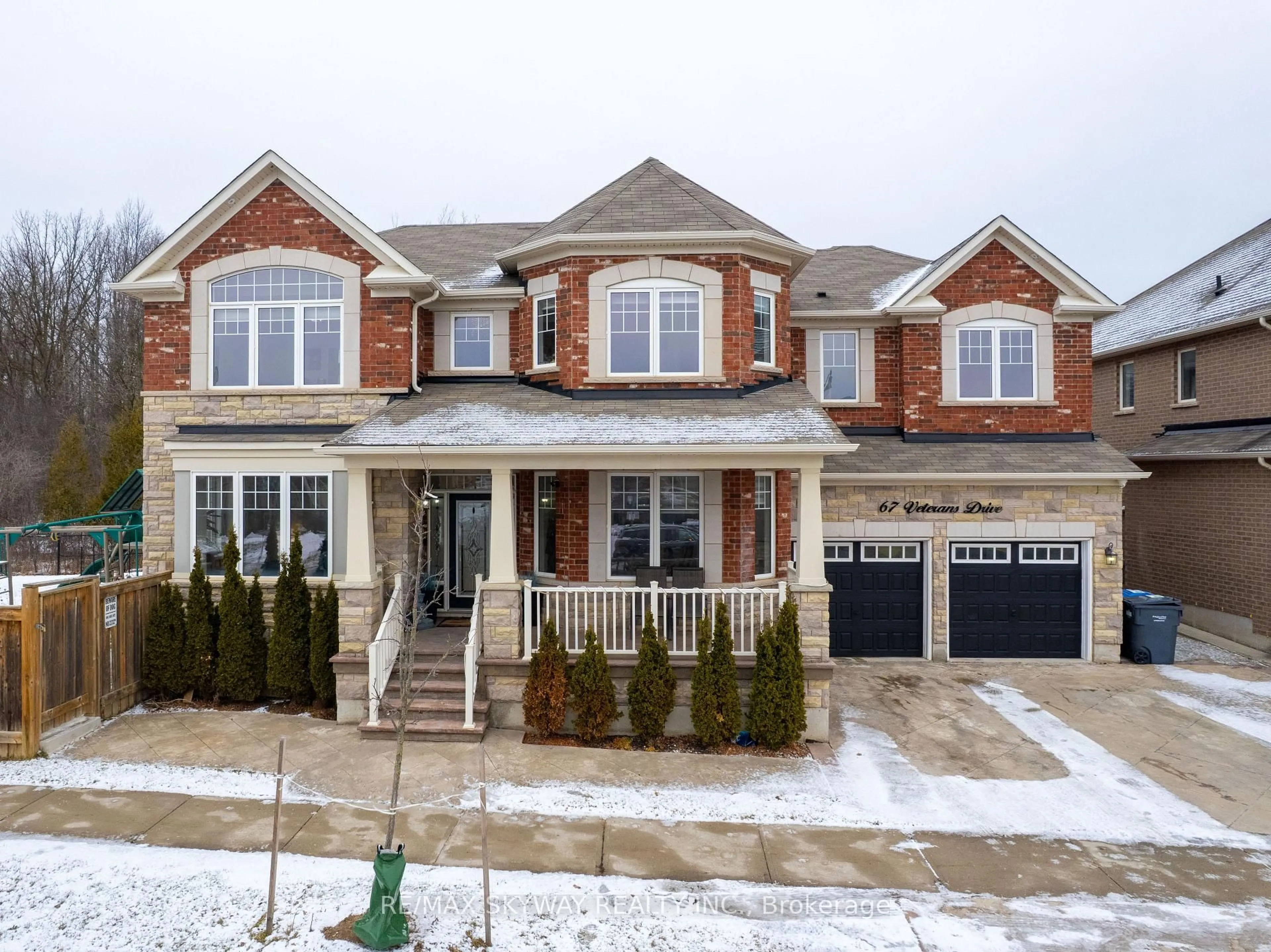 Home with brick exterior material, street for 67 Veterans Dr, Brampton Ontario L7A 0T6