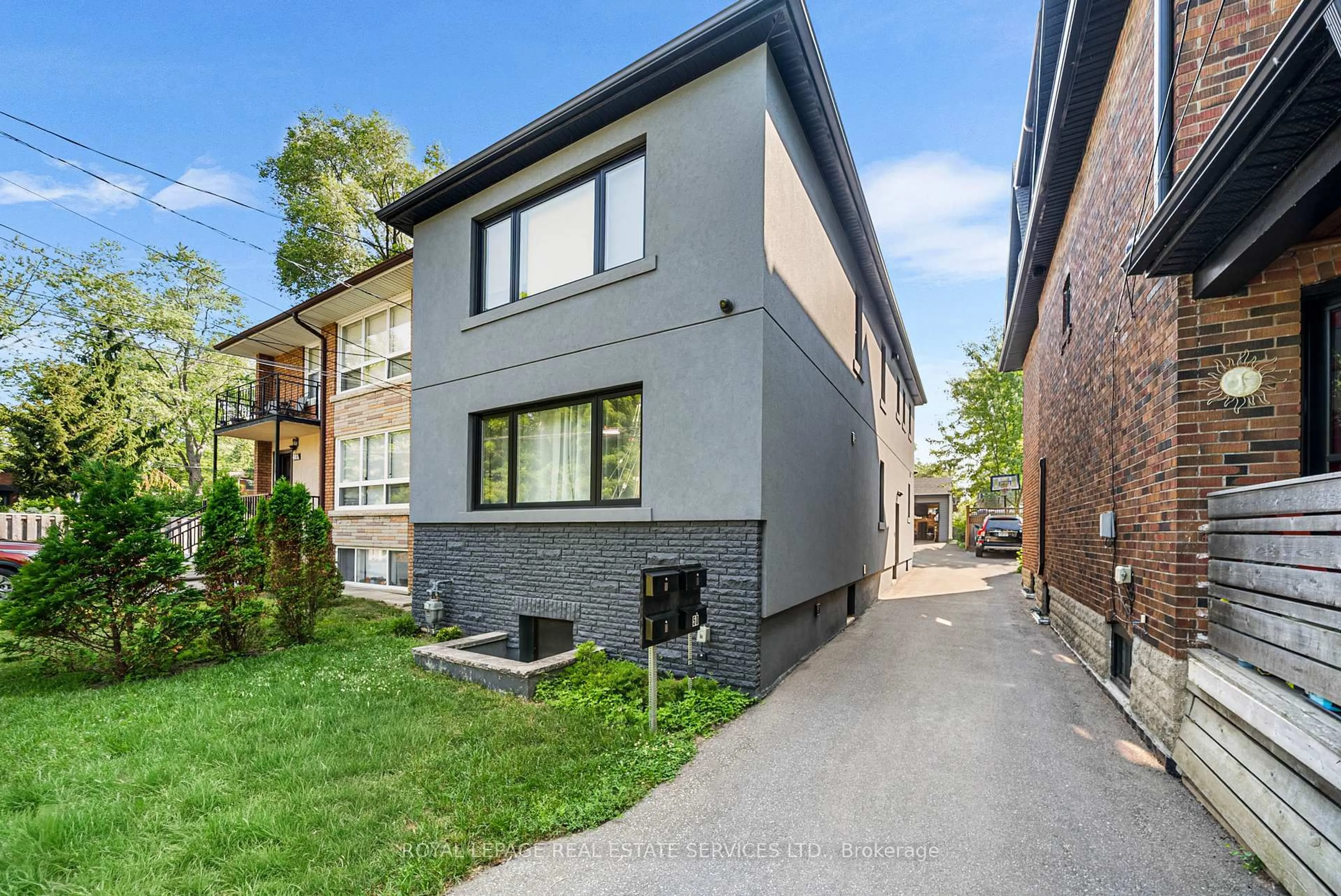 Home with brick exterior material, street for 50 Arcadian Circ, Toronto Ontario M8W 2Y9