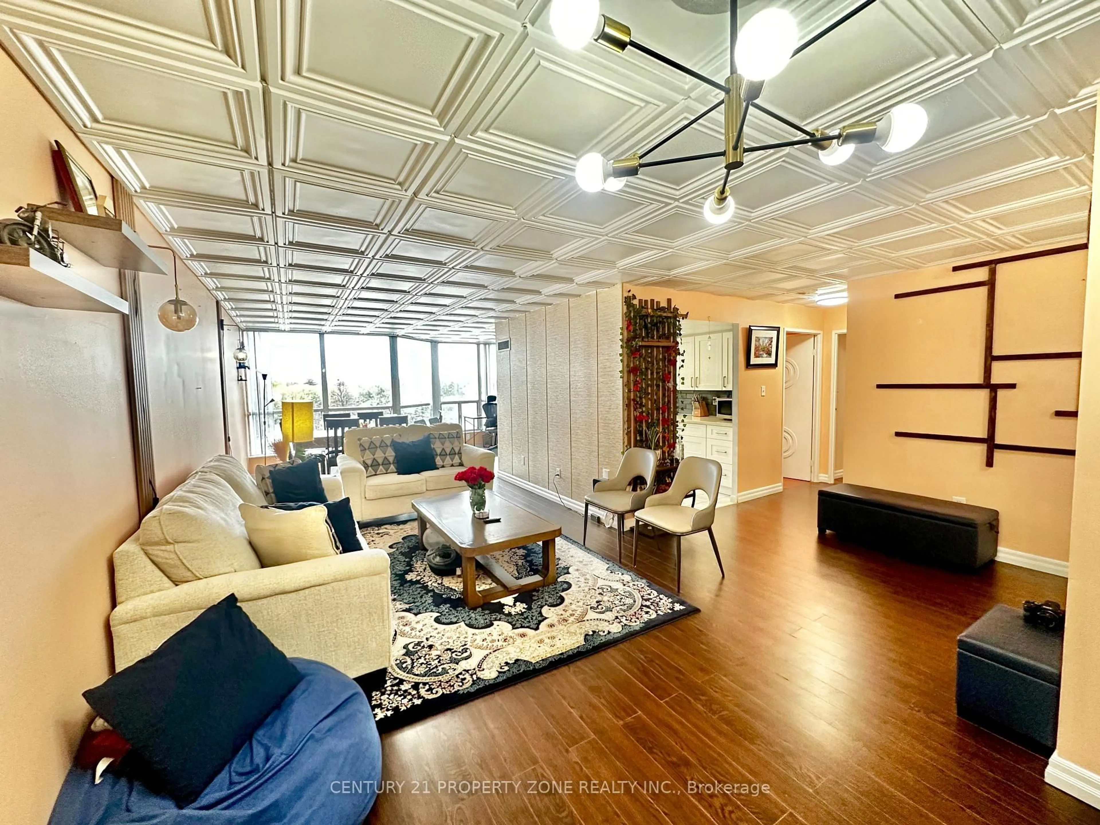 Living room with furniture, wood/laminate floor for 3 Rowntree Rd #510, Toronto Ontario M9V 5G8