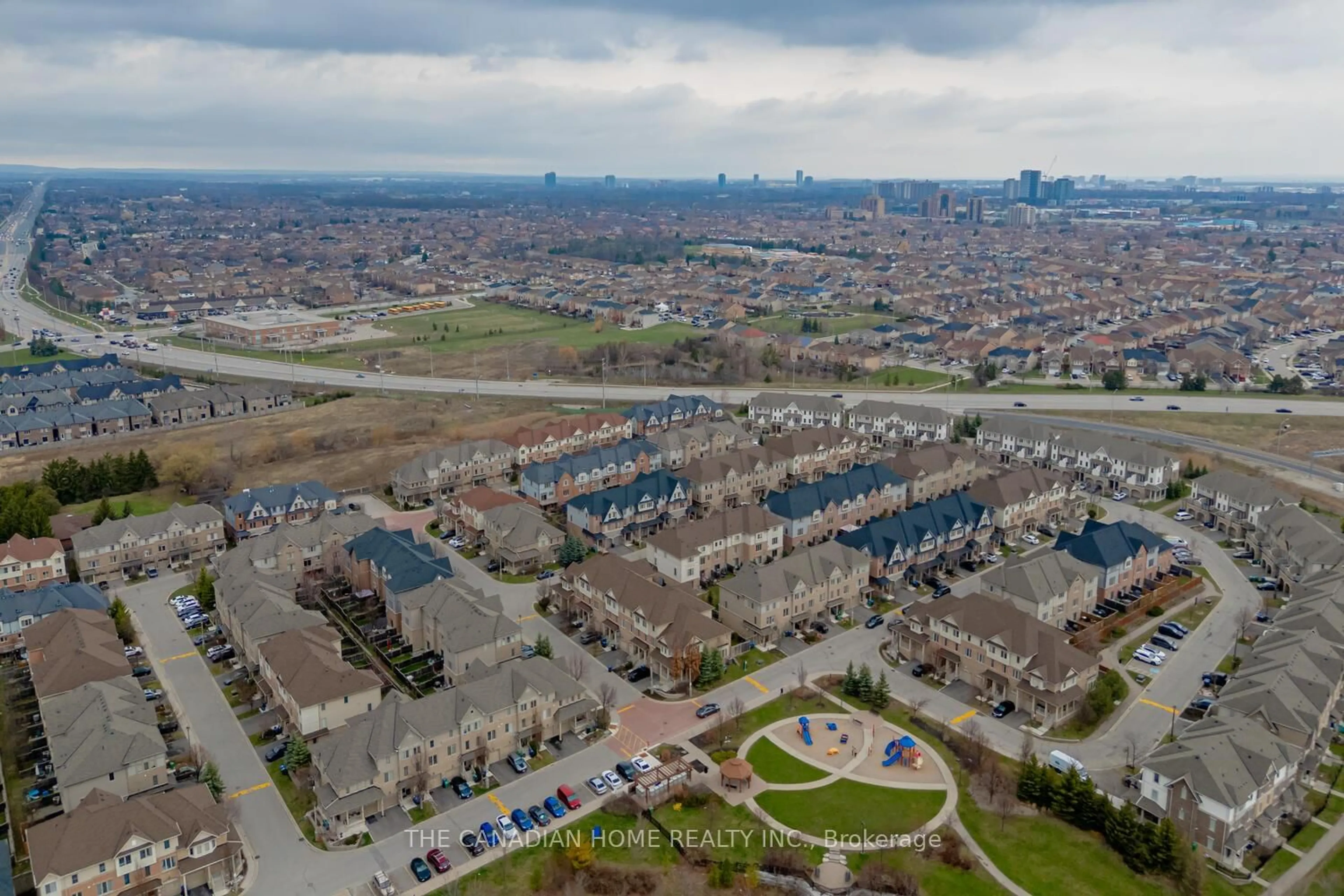 A pic from outside/outdoor area/front of a property/back of a property/a pic from drone, city buildings view from balcony for 48 Cedar Lake Cres, Brampton Ontario L6Y 0P9