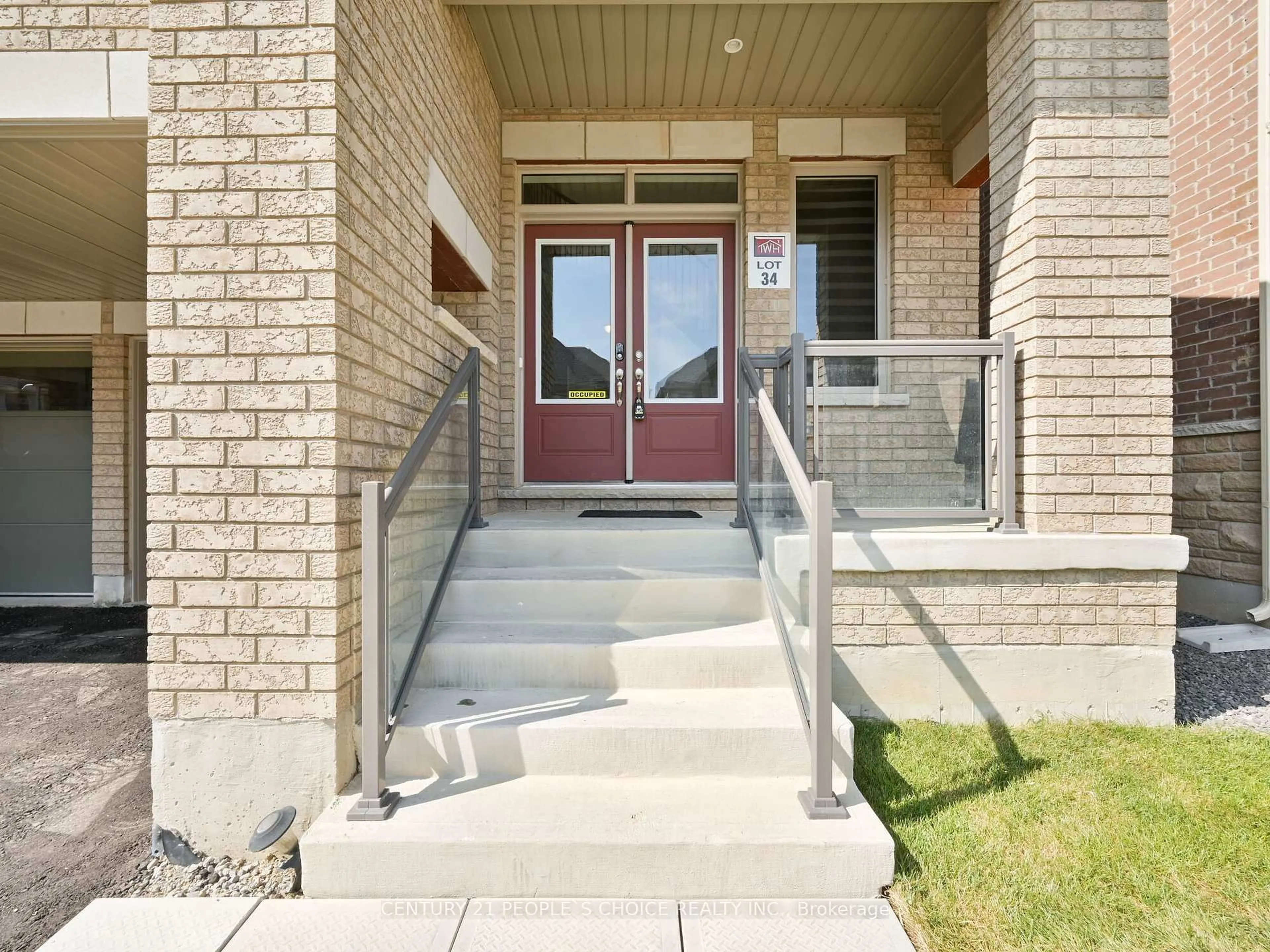 Home with brick exterior material, street for 12 Junior Rd, Brampton Ontario L7A 5J4