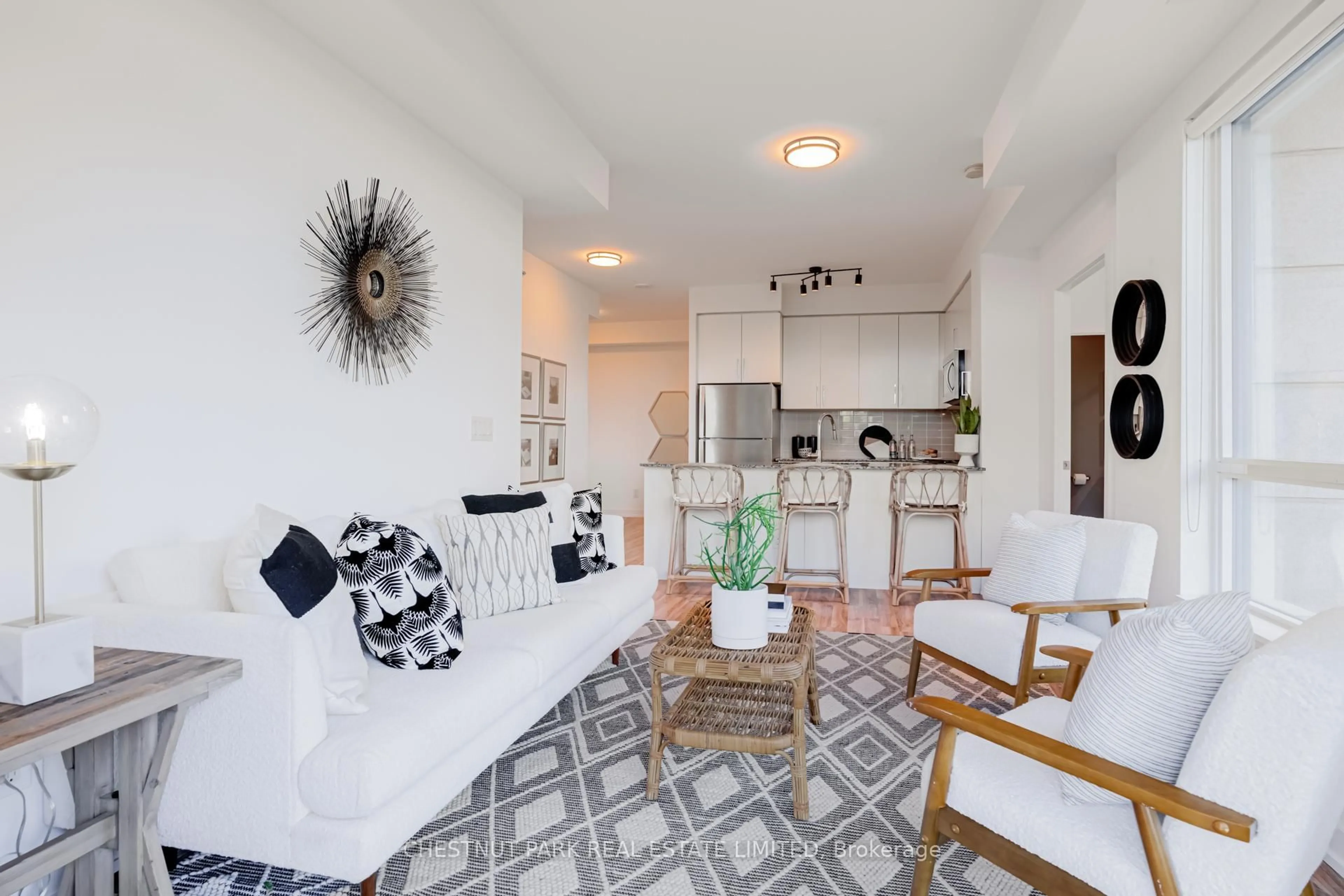 Living room with furniture, ceramic/tile floor for 840 Queens Plate Dr #205, Toronto Ontario M9W 0E7