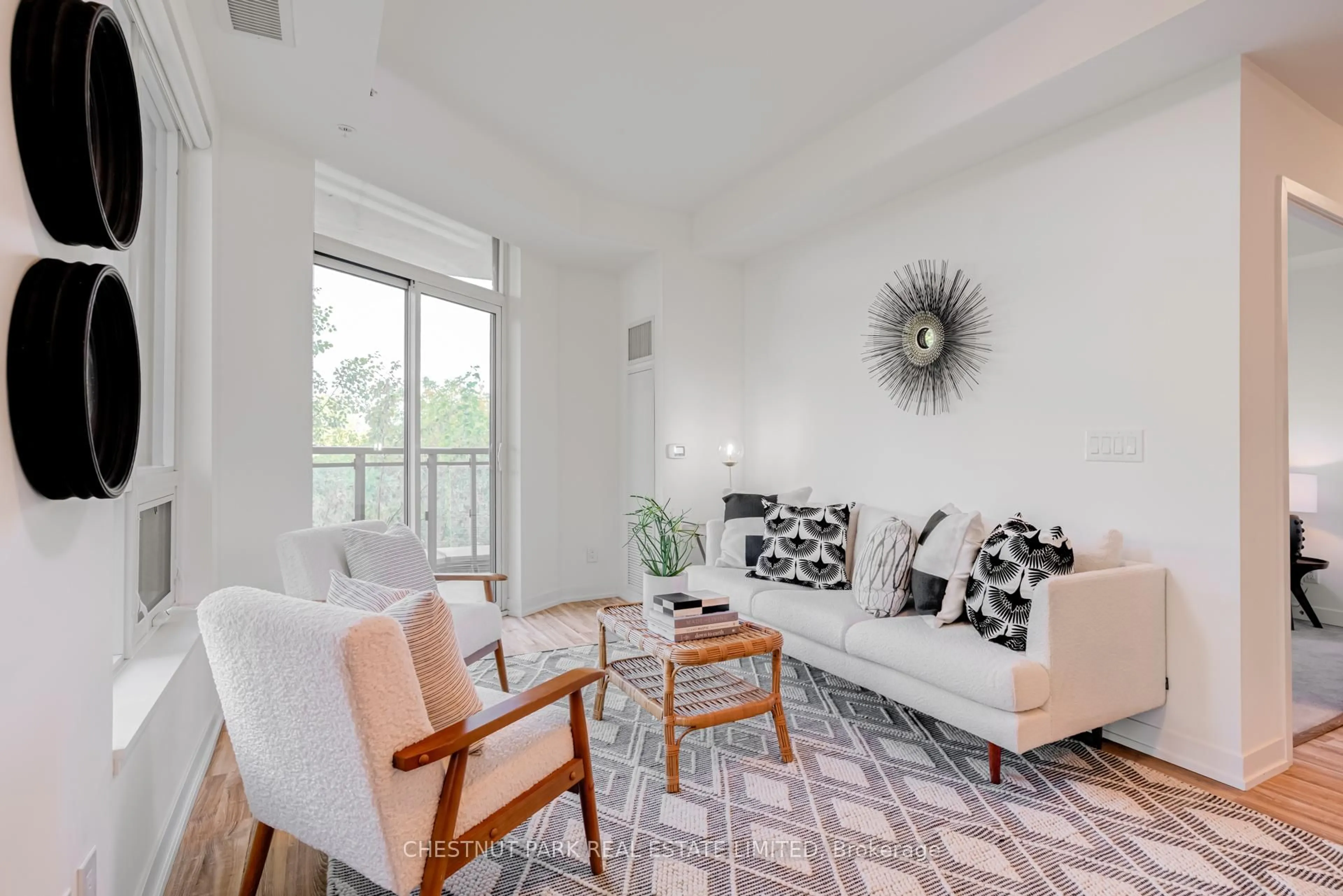 Living room with furniture, unknown for 840 Queens Plate Dr #205, Toronto Ontario M9W 0E7