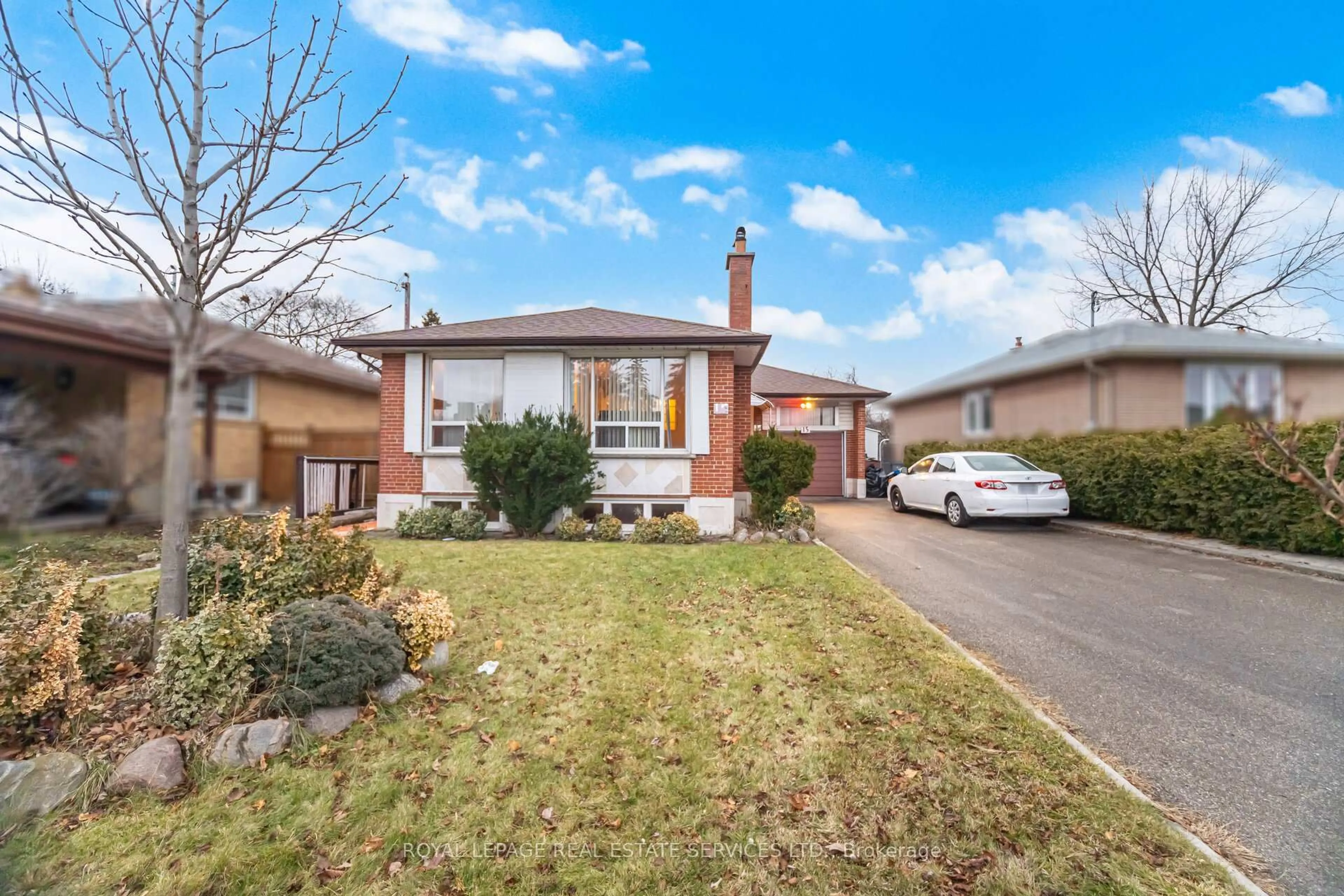 Home with brick exterior material, street for 15 Stevenharris Dr, Toronto Ontario M9C 1T9