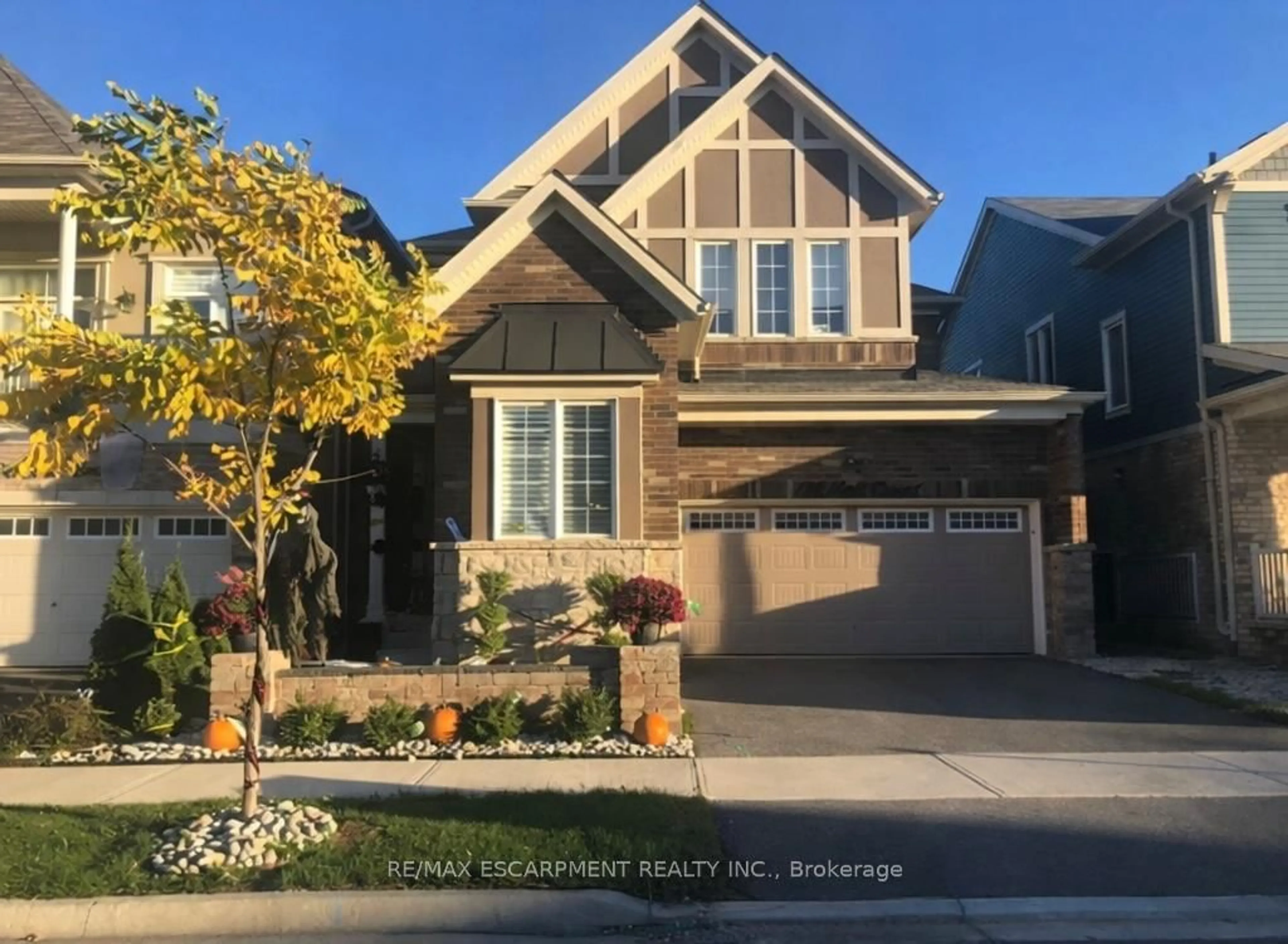 Home with brick exterior material, street for 136 HATT Crt, Milton Ontario L9E 1G7