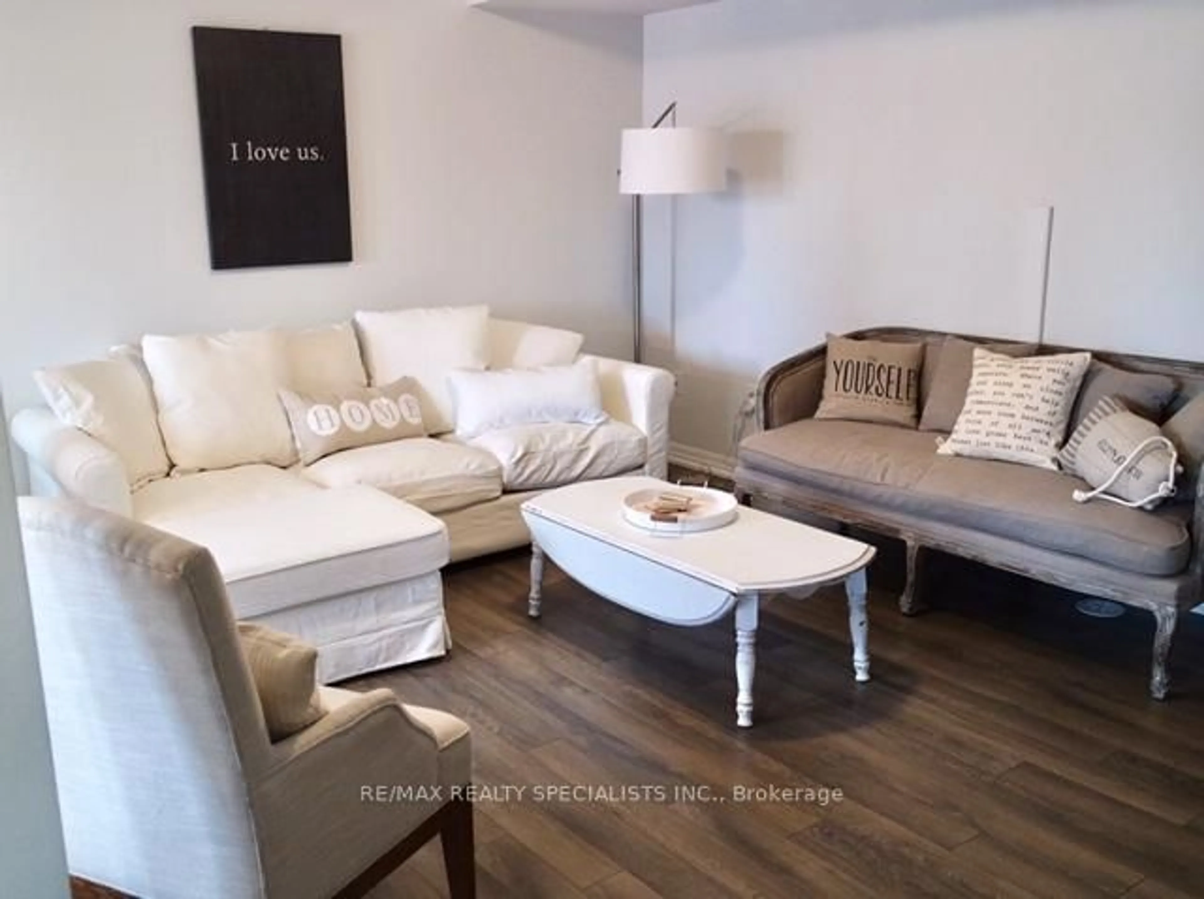 Living room with furniture, wood/laminate floor for 316 Jemima Dr, Oakville Ontario L6M 0V6