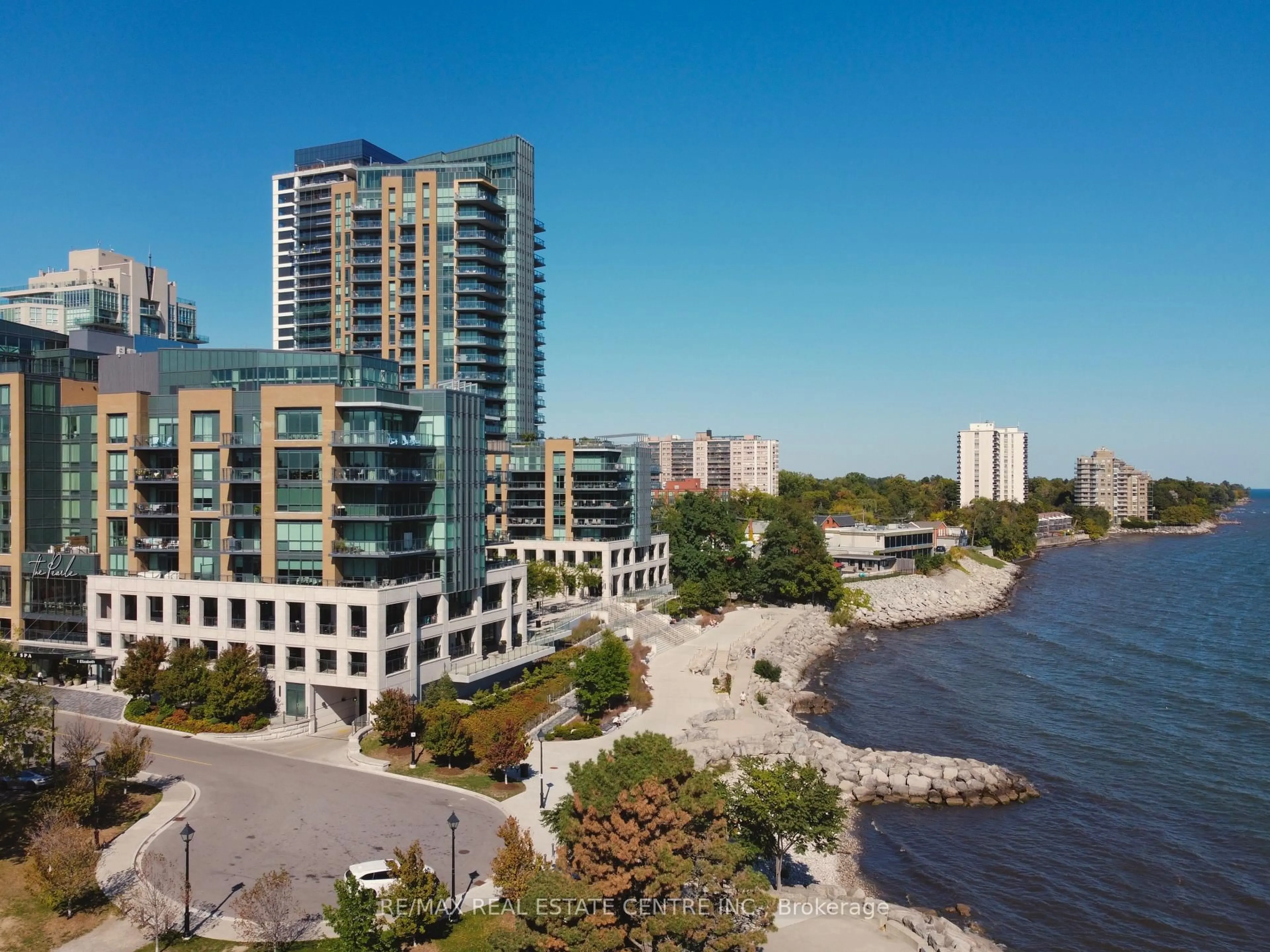 A pic from outside/outdoor area/front of a property/back of a property/a pic from drone, water/lake/river/ocean view for 2060 Lakeshore Rd #405, Burlington Ontario L7R 0G2