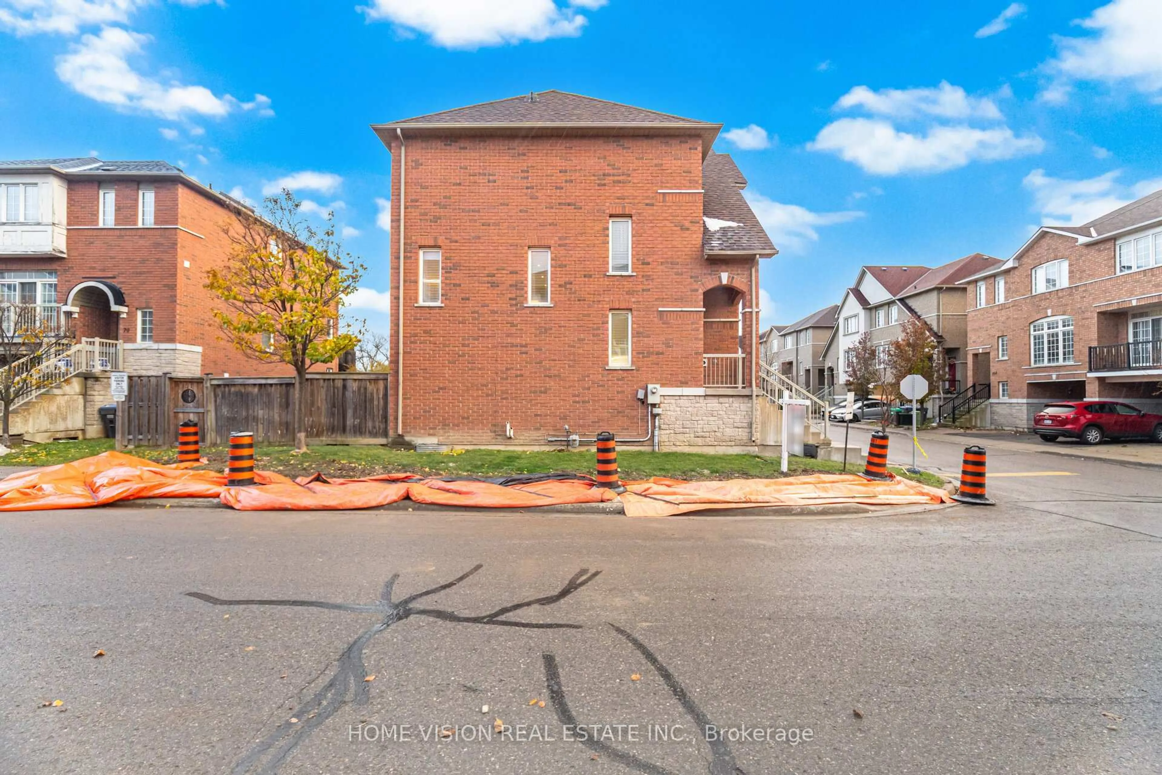 Home with brick exterior material, street for 7155 Magistrate Terr #155, Mississauga Ontario L5W 1Y9
