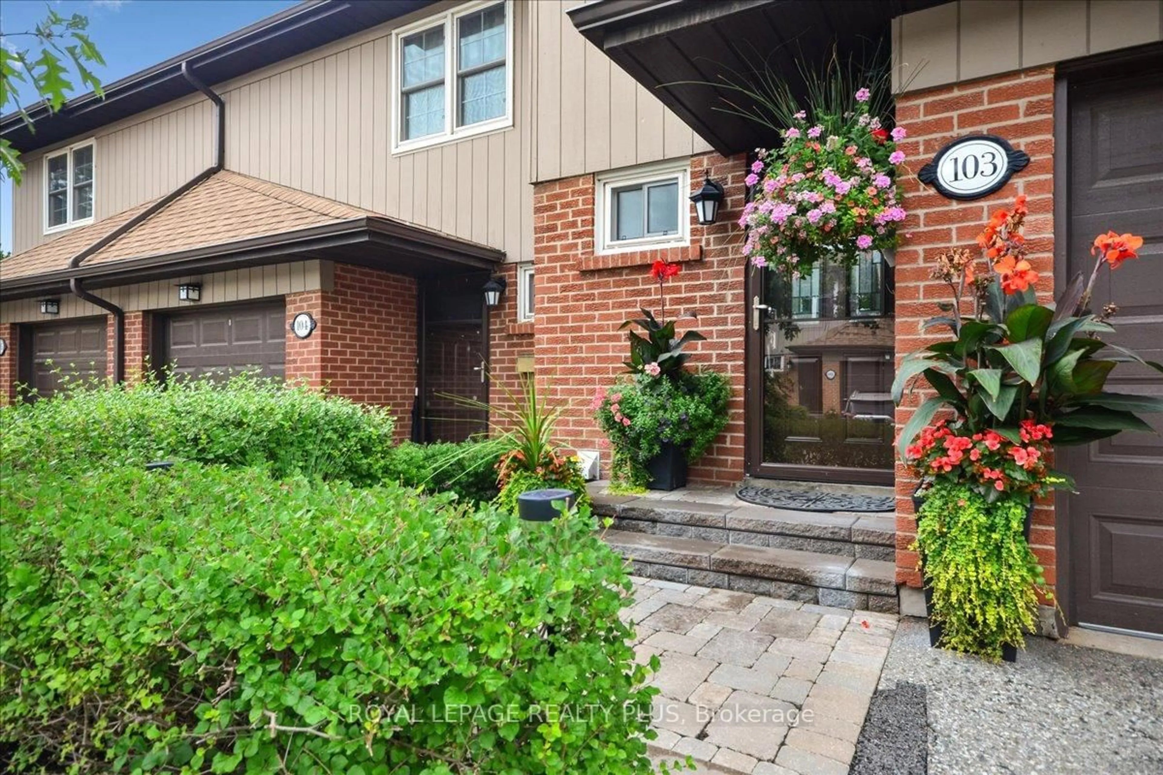 Home with brick exterior material, street for 1951 Rathburn Rd #103, Mississauga Ontario L4W 2N9