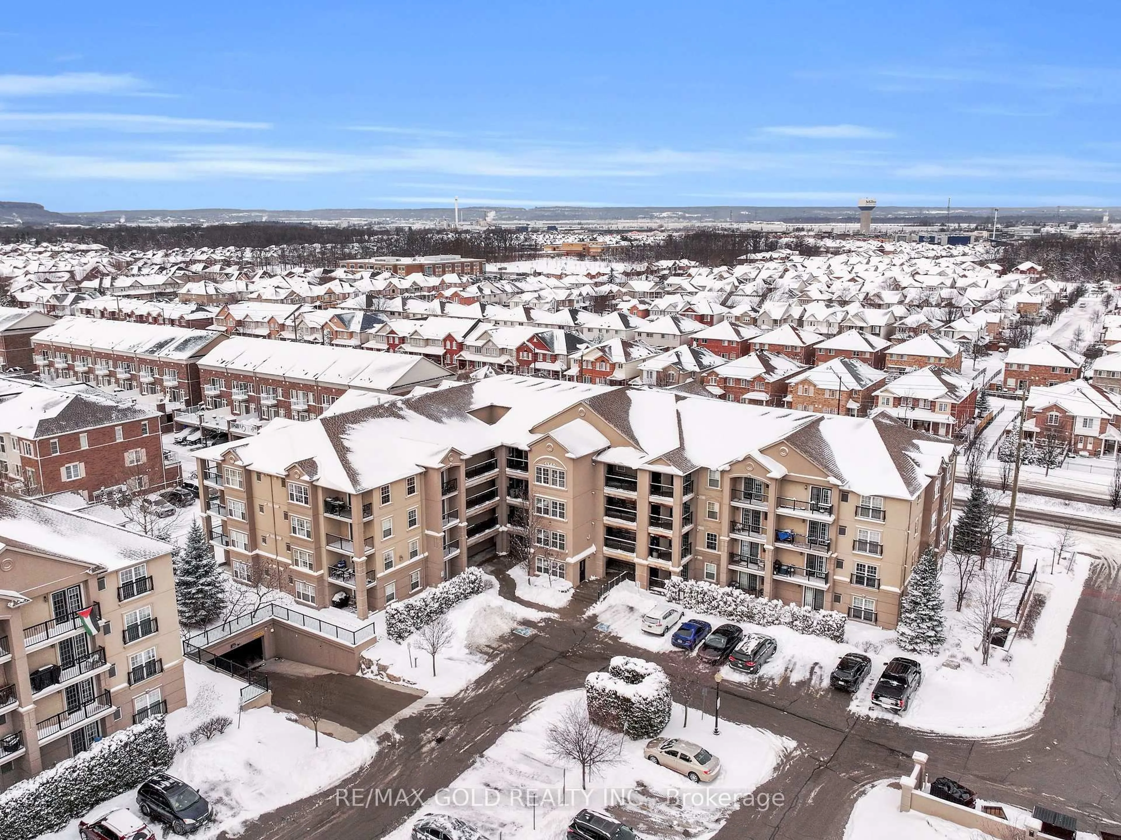 A pic from outside/outdoor area/front of a property/back of a property/a pic from drone, unknown for 1340 Main St #202, Milton Ontario L9T 7S6