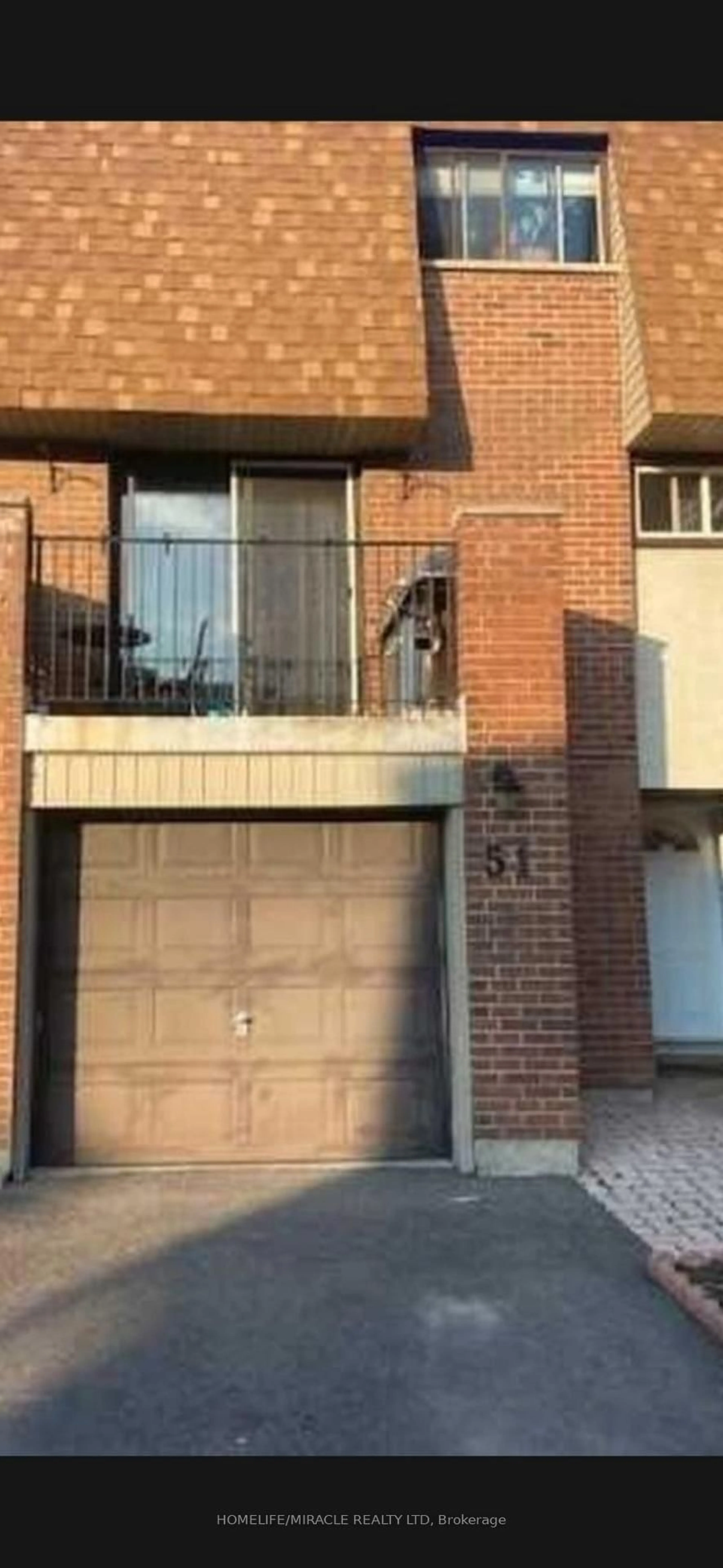 Home with brick exterior material, street for 1051 Cedarglen Gate #51, Mississauga Ontario L5C 3A7