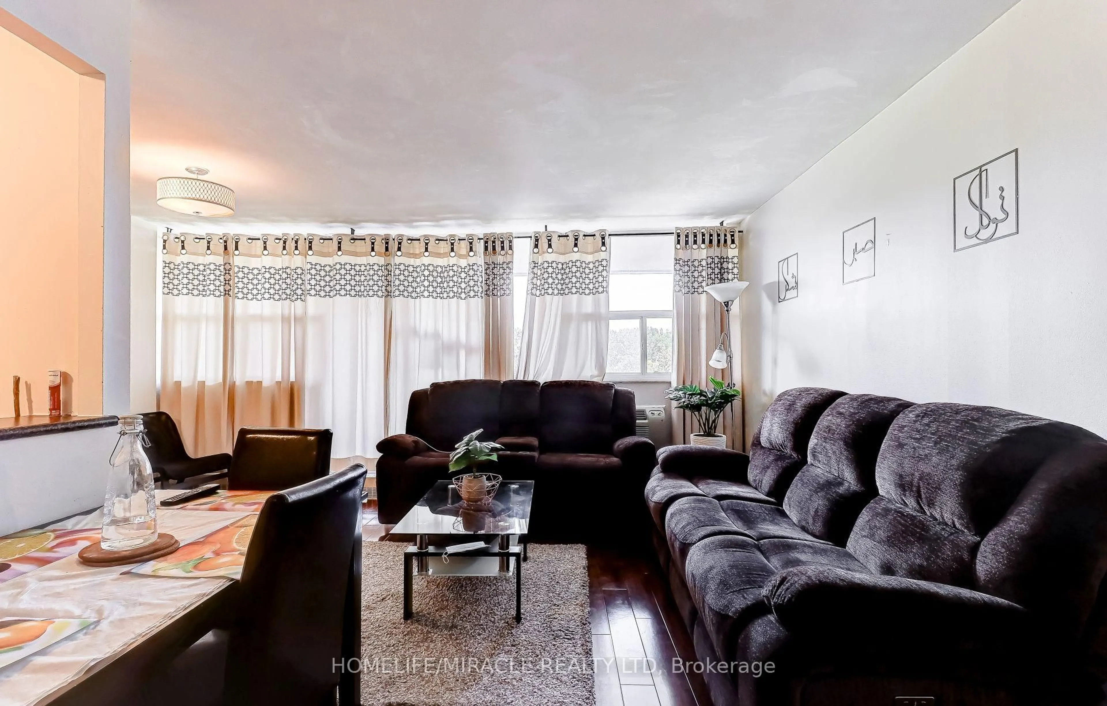 Living room with furniture, unknown for 3501 Glen Erin Dr #409, Mississauga Ontario L5L 2E9